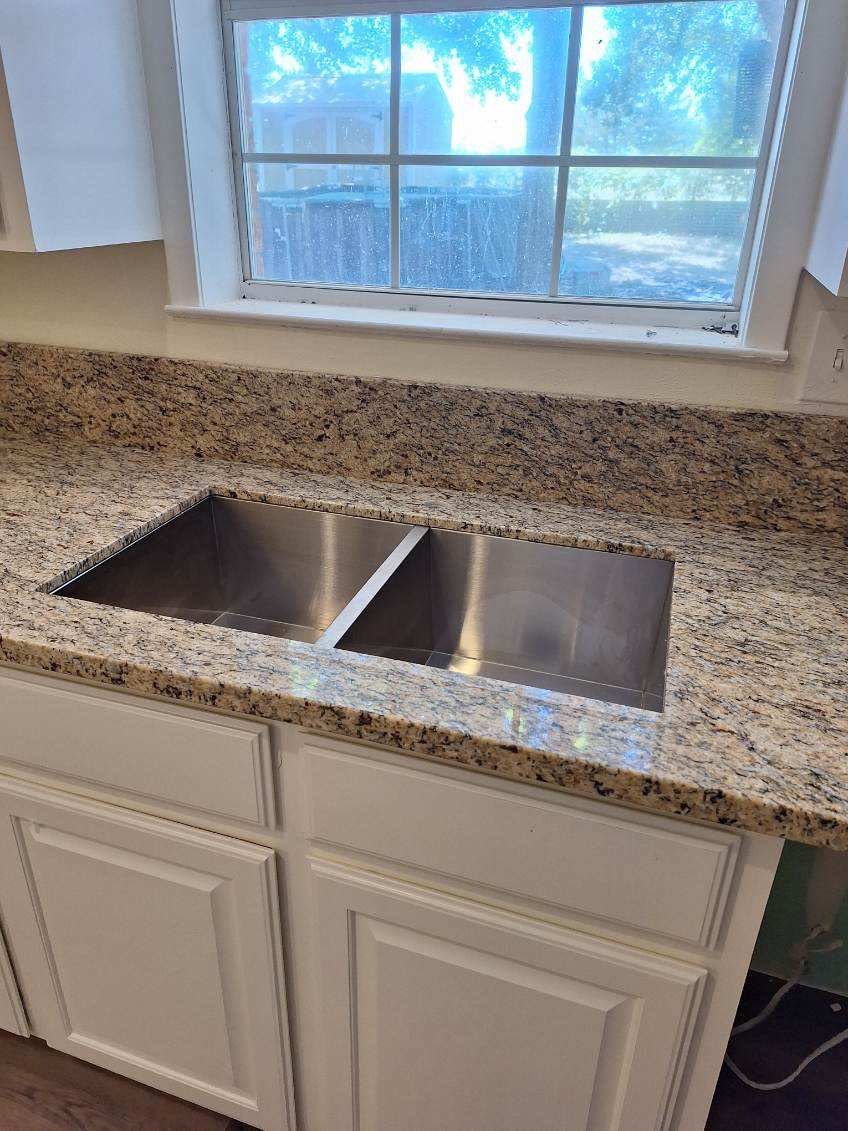 Home Remodel after Huge Water Damage by L&T General Contractors and Restoration INC