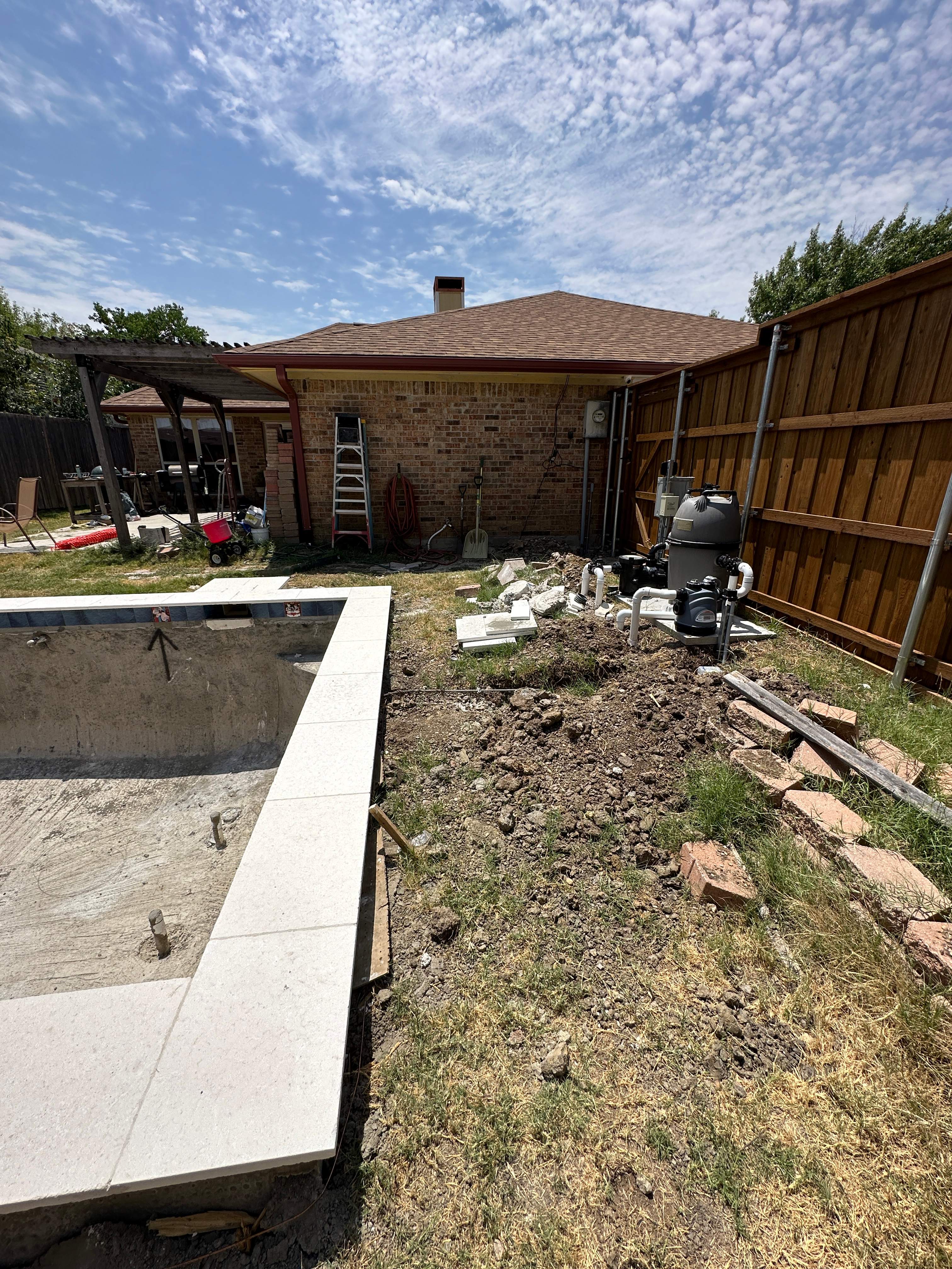 Geometric Pool with Tanning Ledge by Pinnacle Pools and Spas - DFW