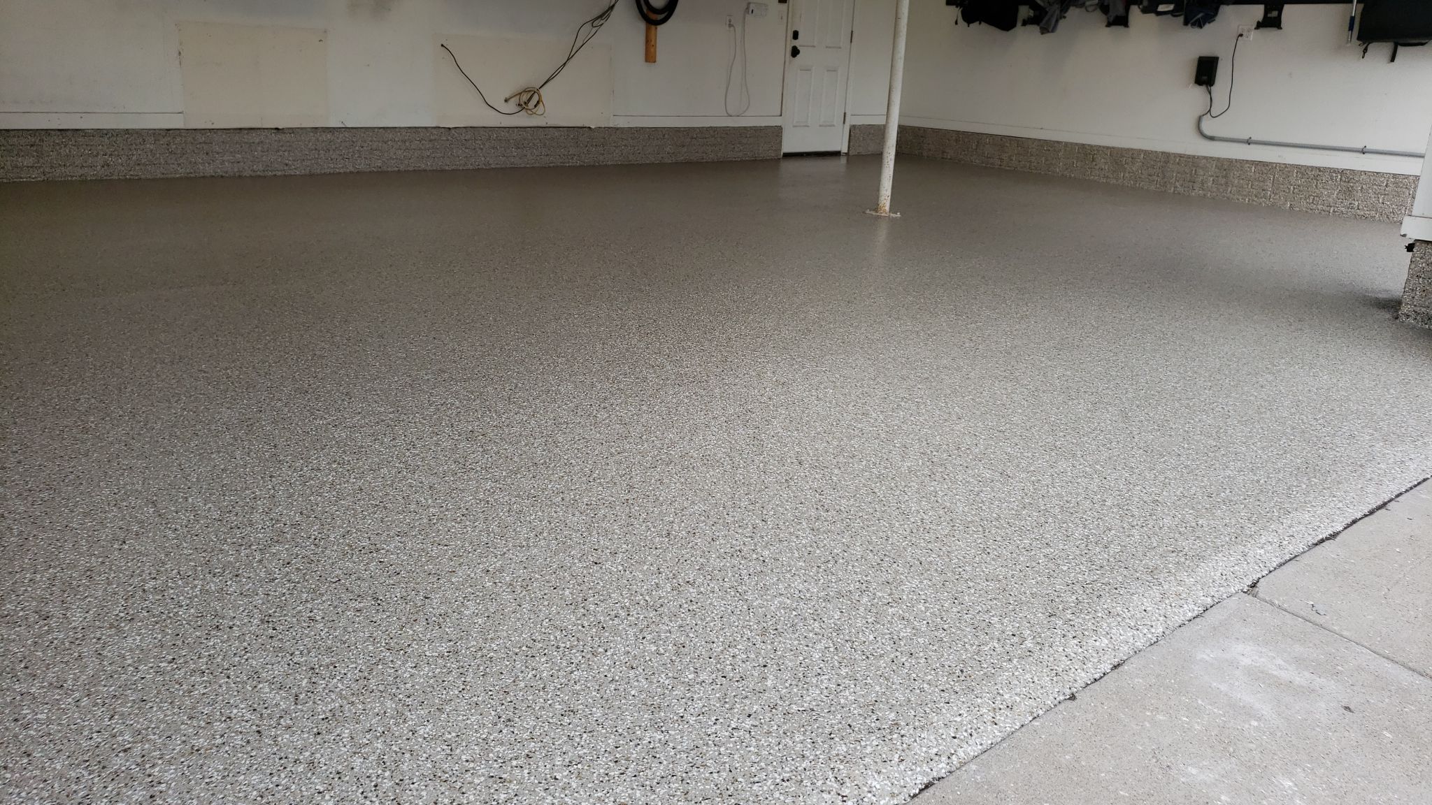 Garage Floor Coating using Polyurea by Revival Concrete Coatings
