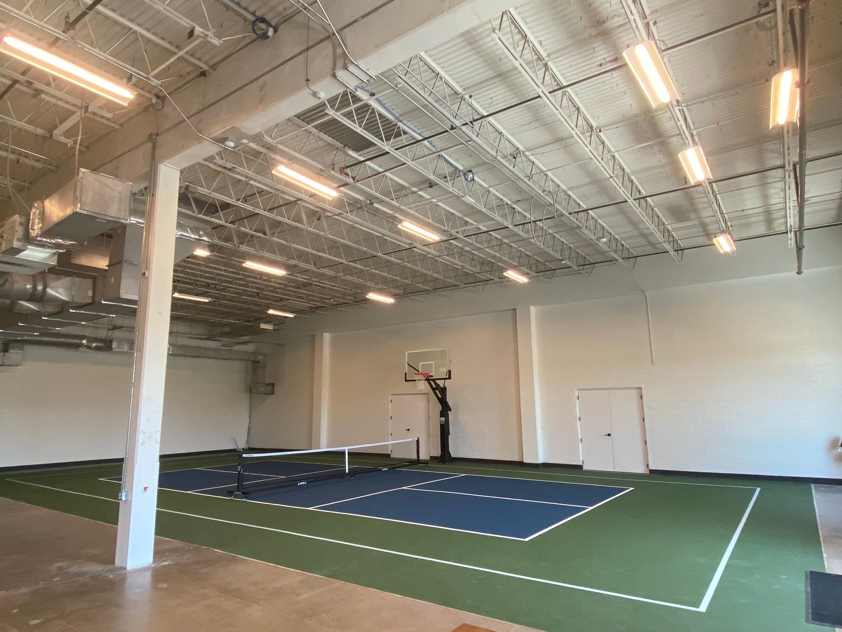 Magnolia HQ.... Pickleball, Basketball Volleyball Court by Sport Court Austin