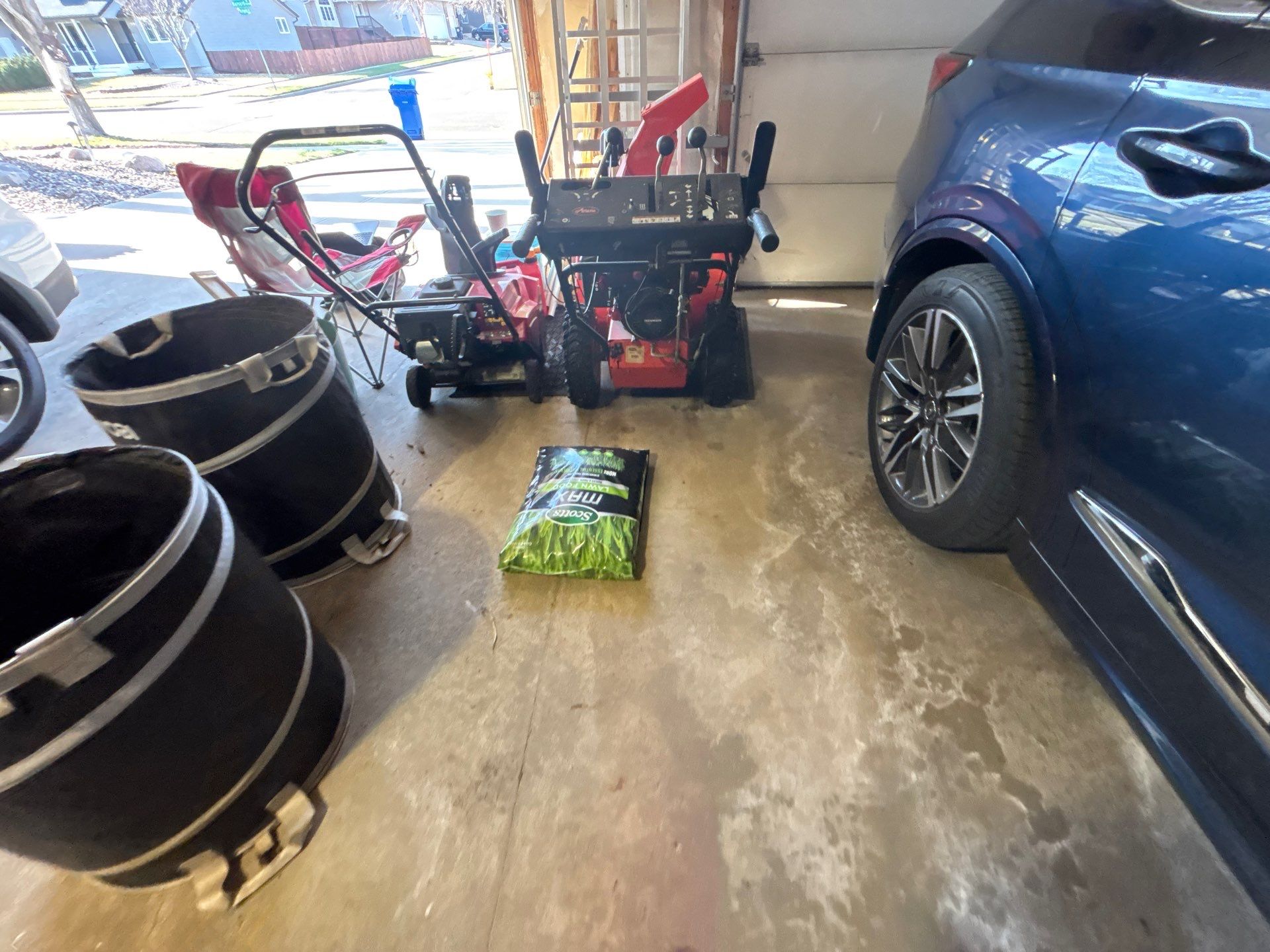 Sioux Falls Garage Concrete Repair and Epoxy Flake Floor Coating by Select Painting, Coatings & Garage Cabinets