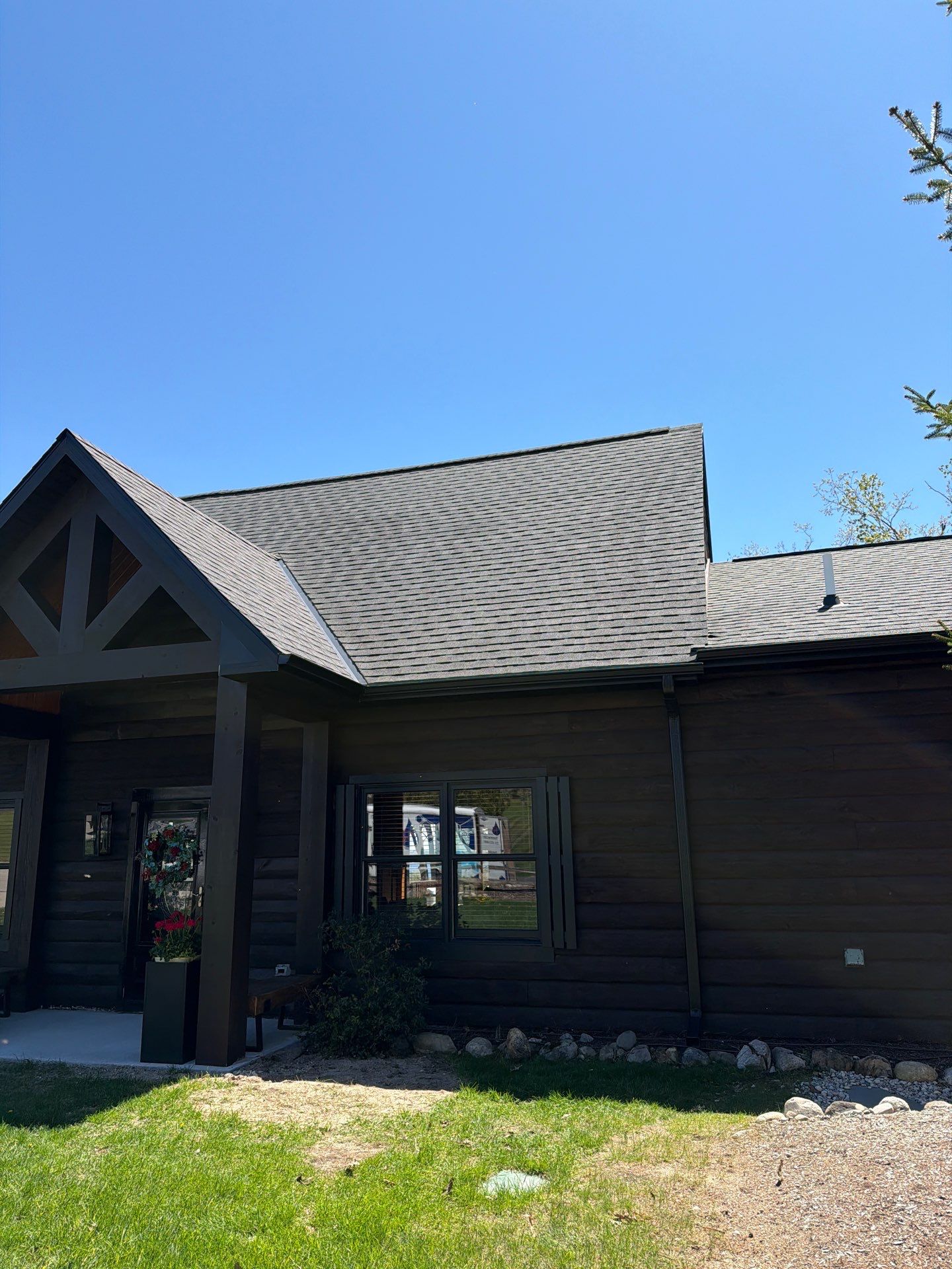Seamless Gutter Installation for Log Sided Home in Harbor Springs by Rainbow Seamless Systems