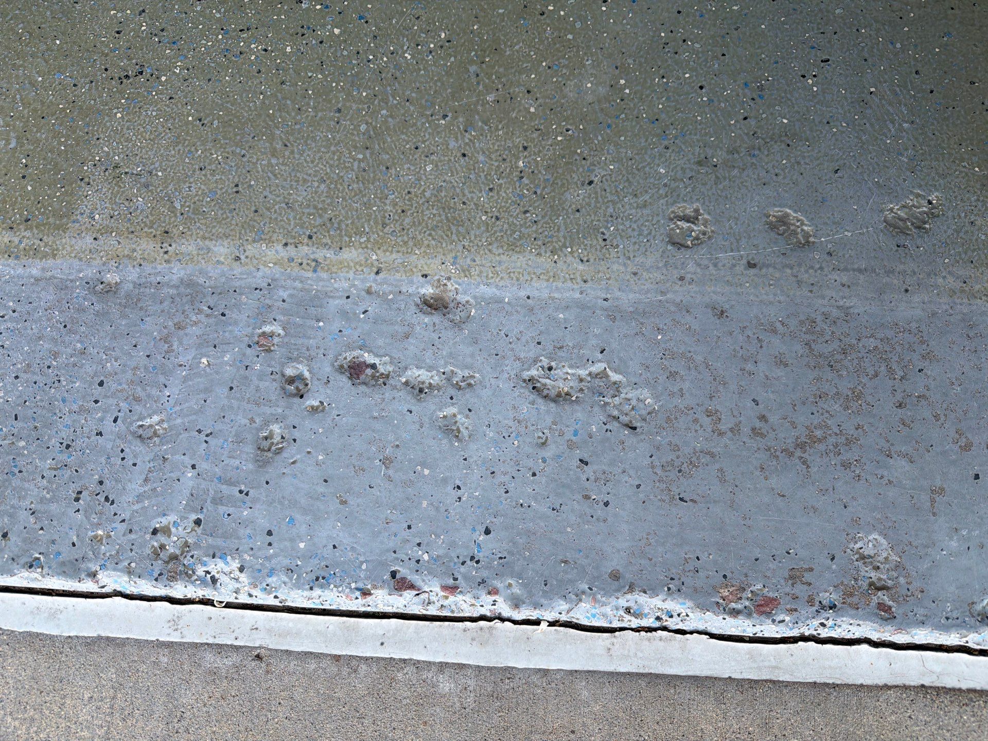 Multi-Car Garage Concrete Coating with Coyote Flake Finish in Sioux Falls by Select Painting, Coatings & Garage Cabinets