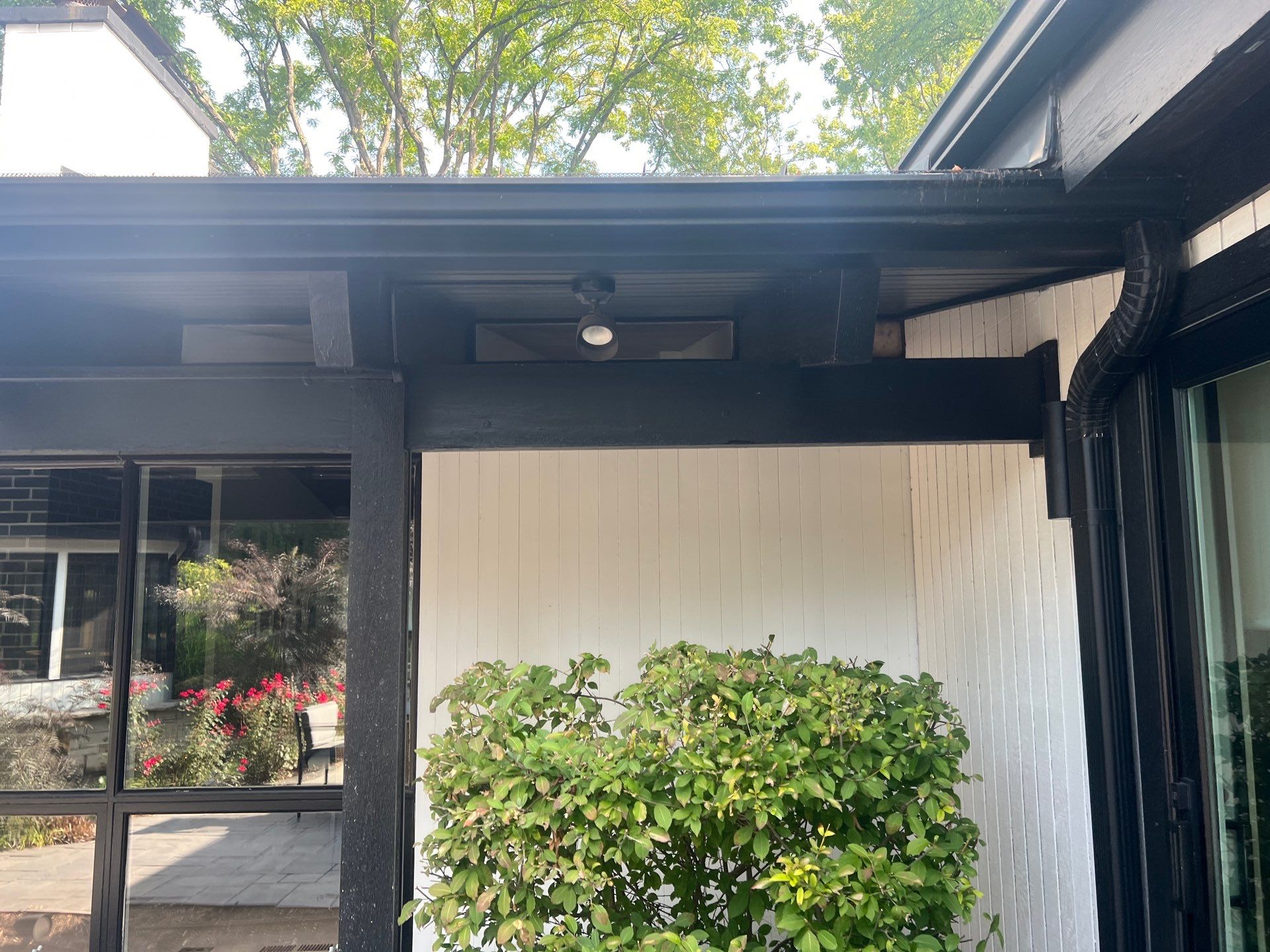 Complete Exterior House, Bluestone & Garage Floor Cleaning by Northern Power Washing LLC.