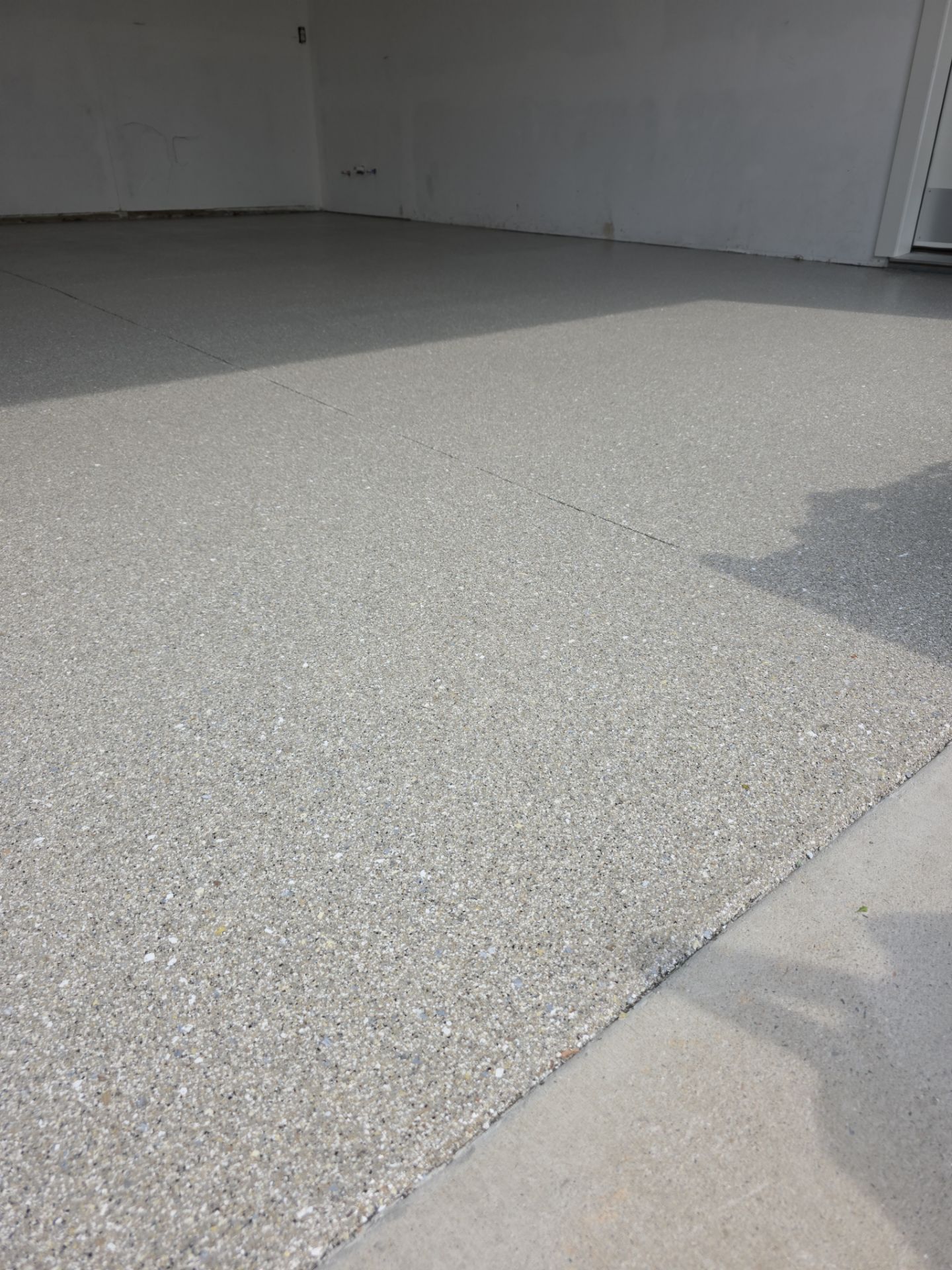 Garage Transformation using Travertine by Croc Coatings, LLC