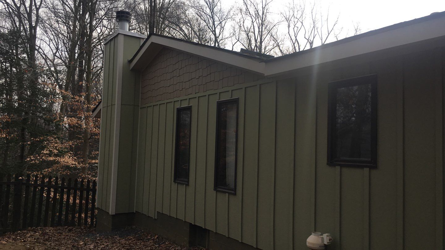 Siding Replacement by American Home Contractors