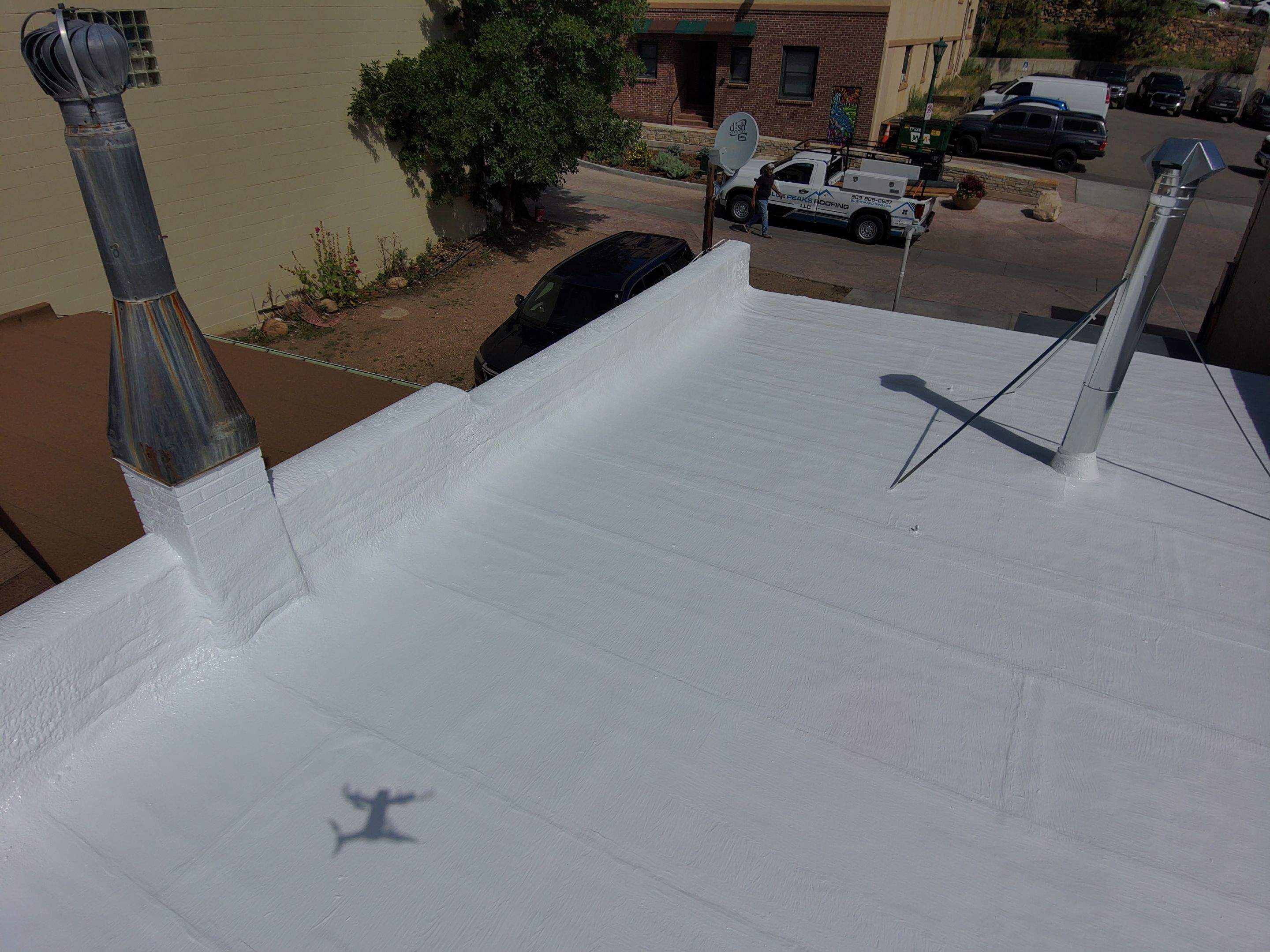 Estes Park "The Taffy Shop" Before & After Gaco Coating by Blue Peaks Roofing LLC