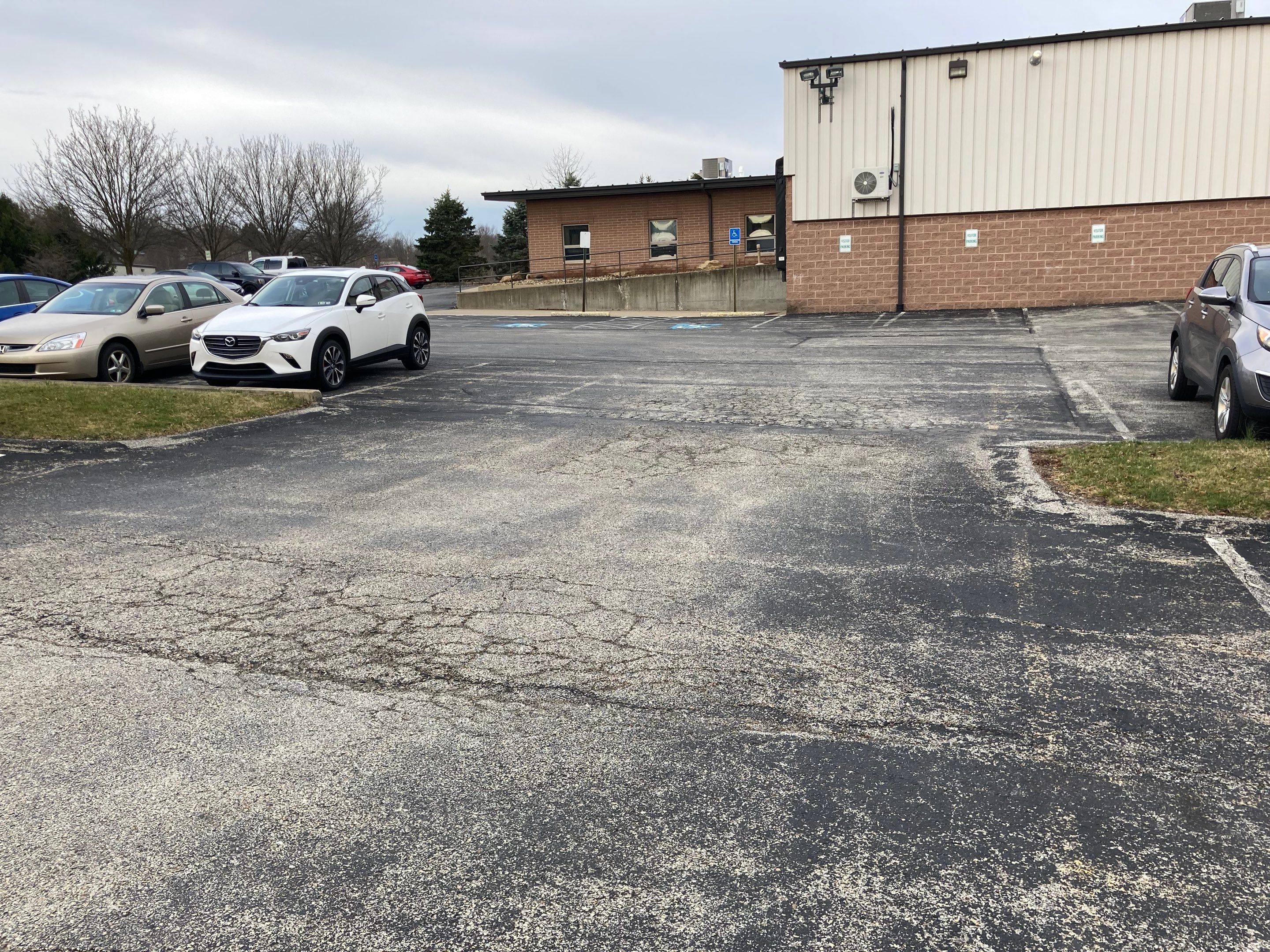 Asphalt Resurface Commercial Park Lot using asphalt by Brant's Asphalt