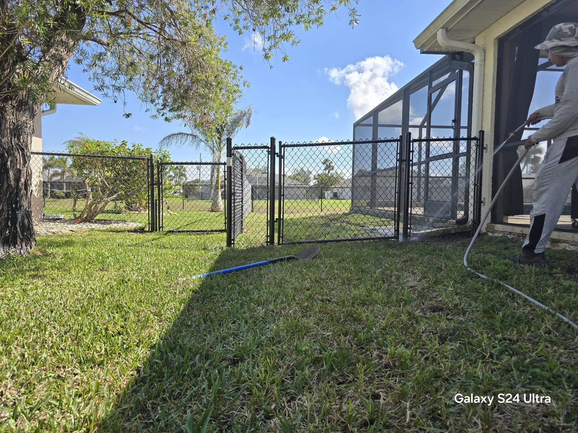 Waterfront Black Chain Link Fence Installation in Rotonda West by True Fence LLC