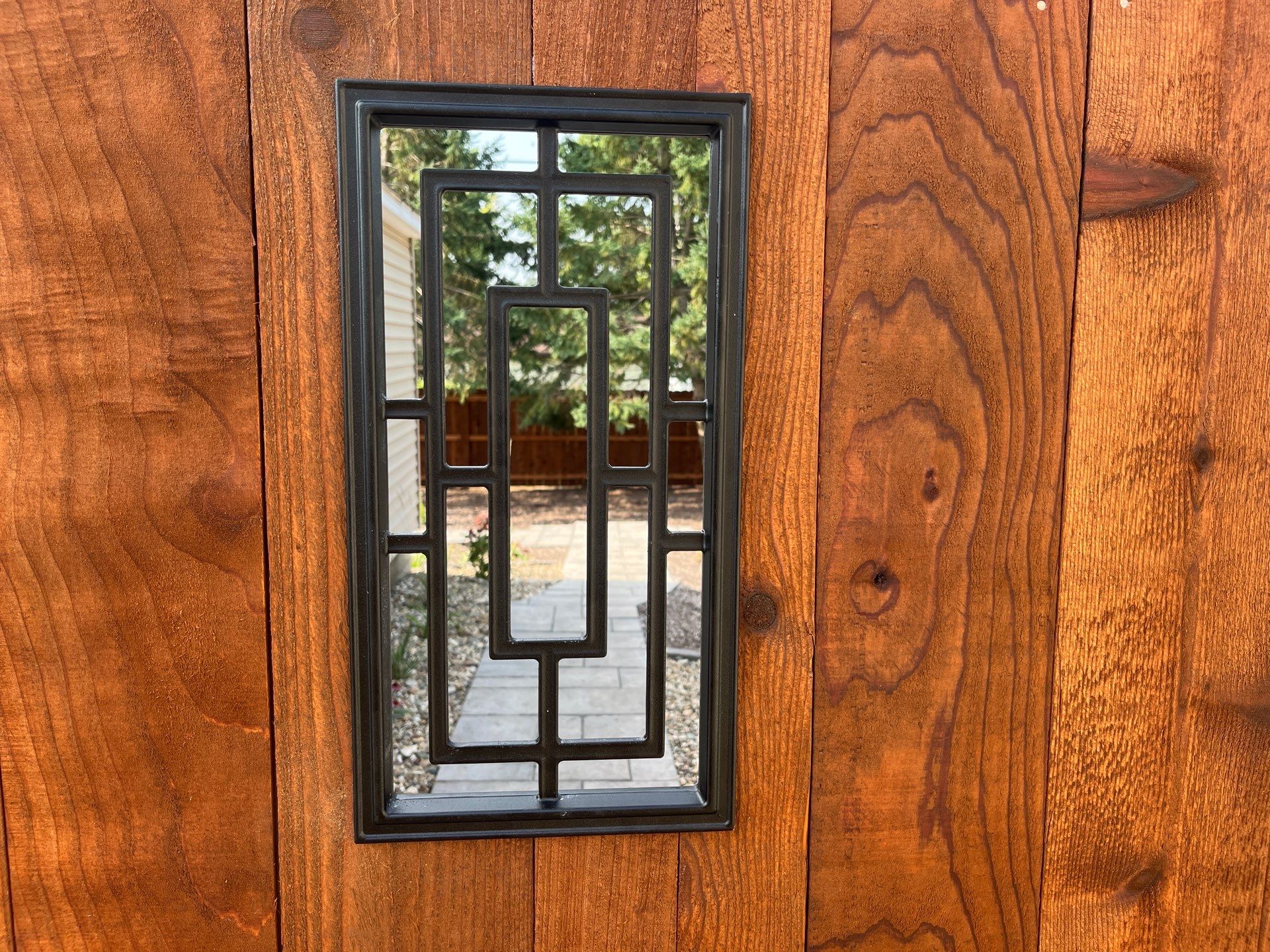 Custom Chestnut Stained Cedar Privacy Fence in Waterloo by Perfect Picket Fence and Stain