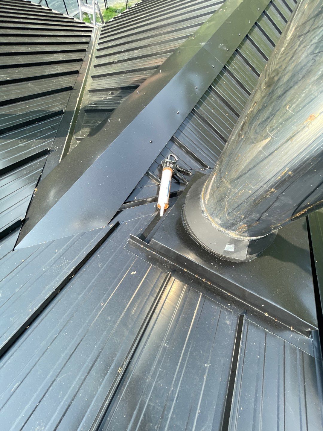 Residential ReRoofing Installation using 12" Prolok metal by Top Notch Roofing Inc