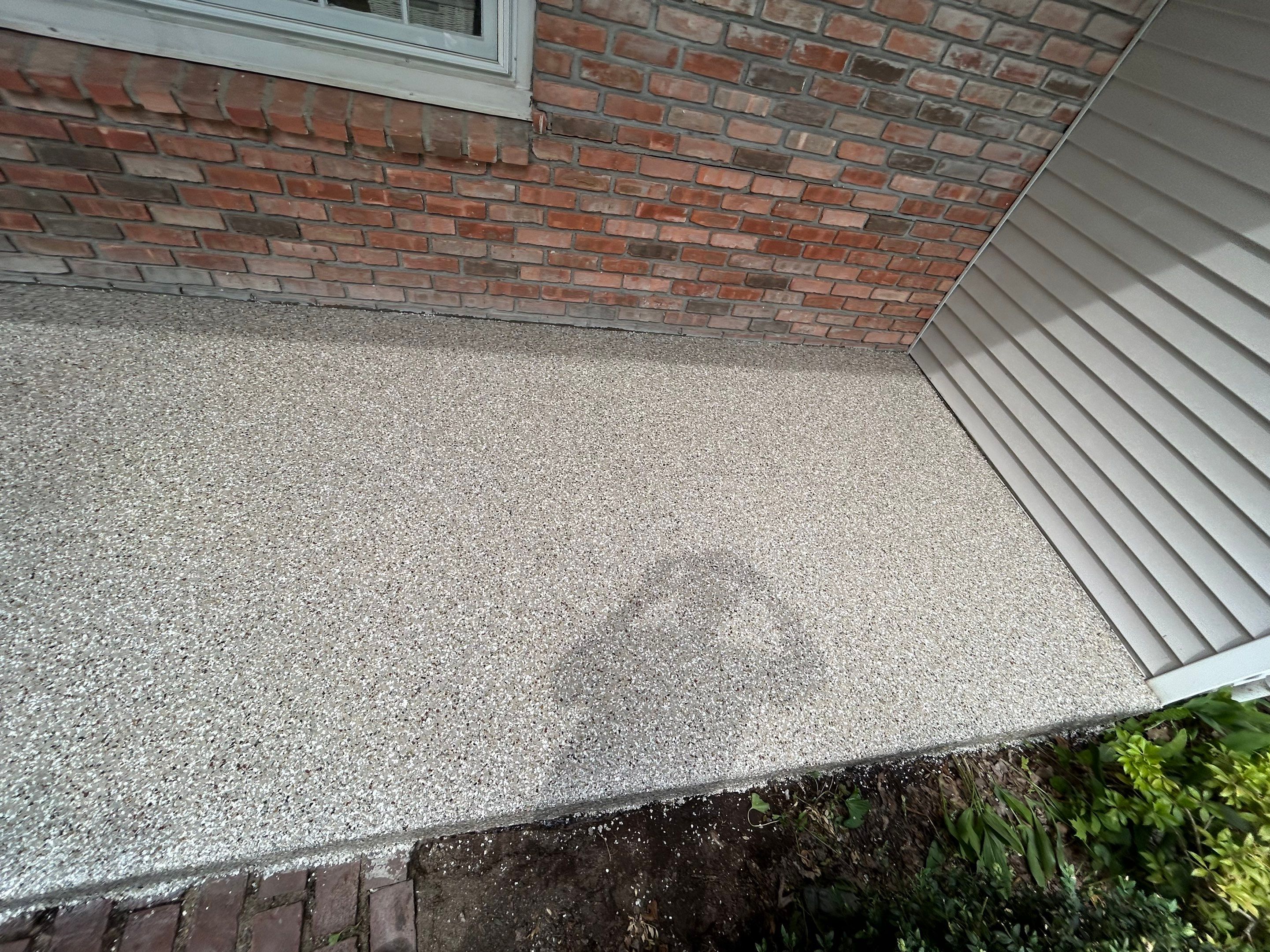 Concrete Floor Coating Transformation by DiGiorgi Roofing and Siding Inc