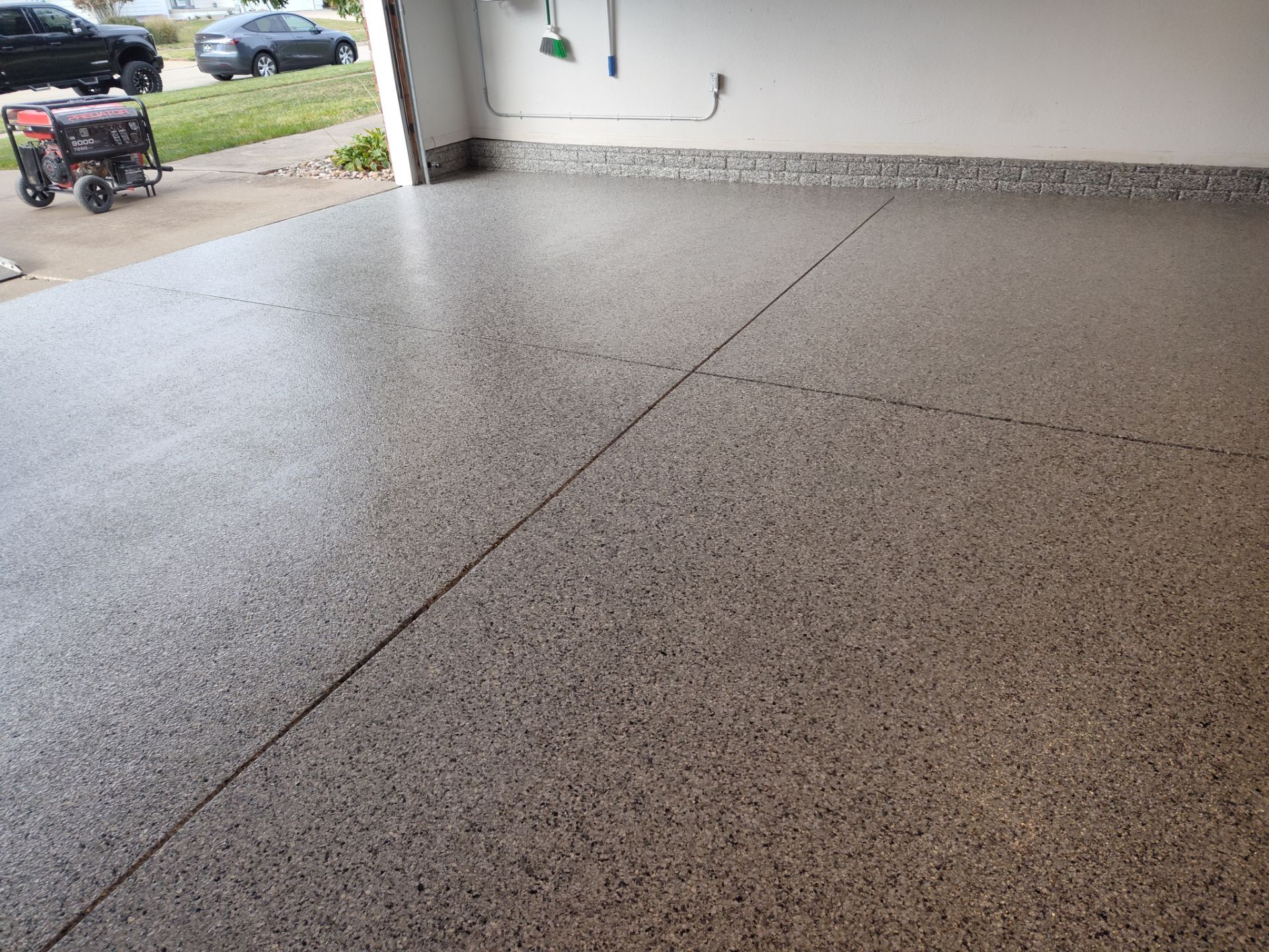 A Garage In One Day Keeps the Rock Salt Away! by Revival Concrete Coatings, LLC