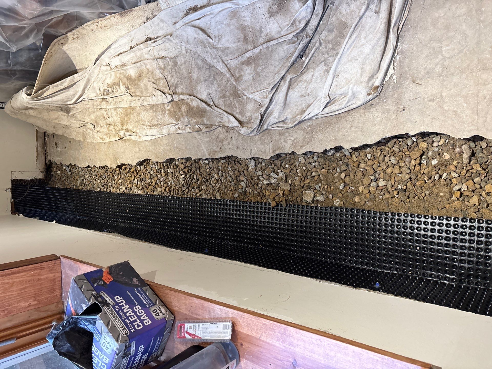 Completing the Connection for Lisa's Drain Tile System by Waterproofing Northeast