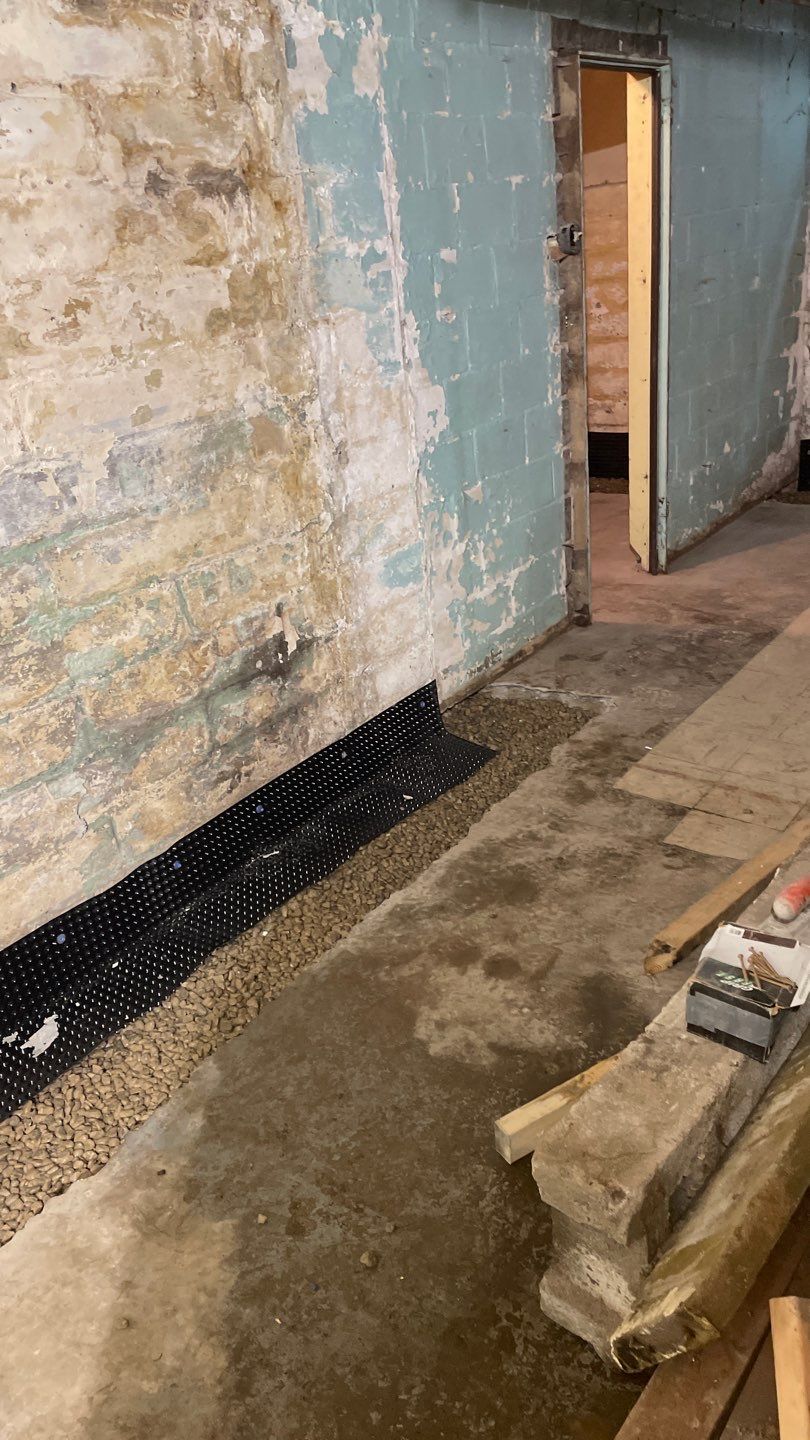 Interior Drain Tile for a South Minneapolis Basement by Waterproofing Northeast
