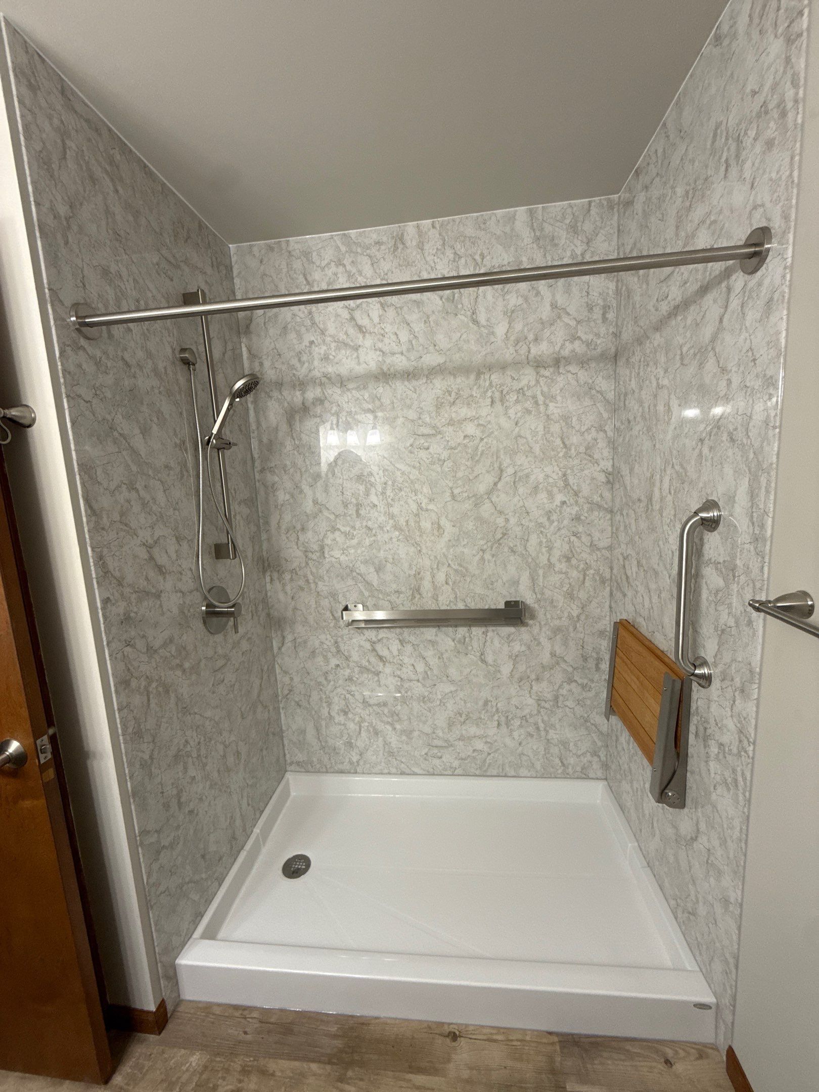 Jacuzzi Walk-In Shower Conversion Featuring Marble Acrylic Walls in Gaylord by Rainbow Seamless Systems