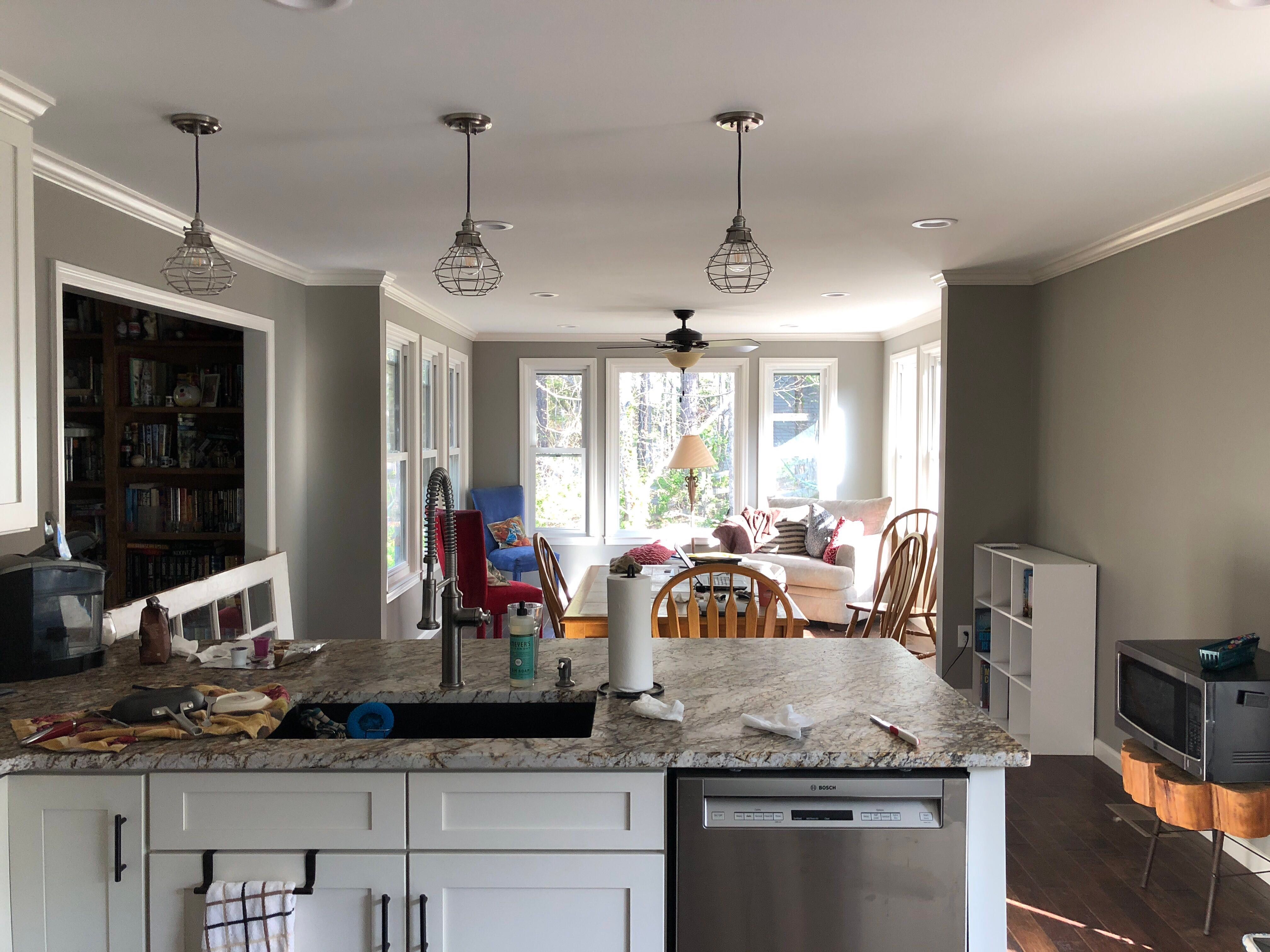 Open Concept Kitchen Remodel With White Shaker Cabinets in Kennesaw by Swift Home Renovations