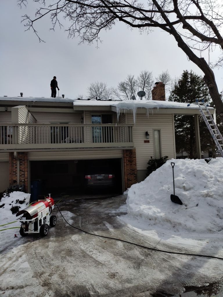 Ice Dam Removal in Eden Prairie by Next Level Seamless Gutters / Exteriors Inc.
