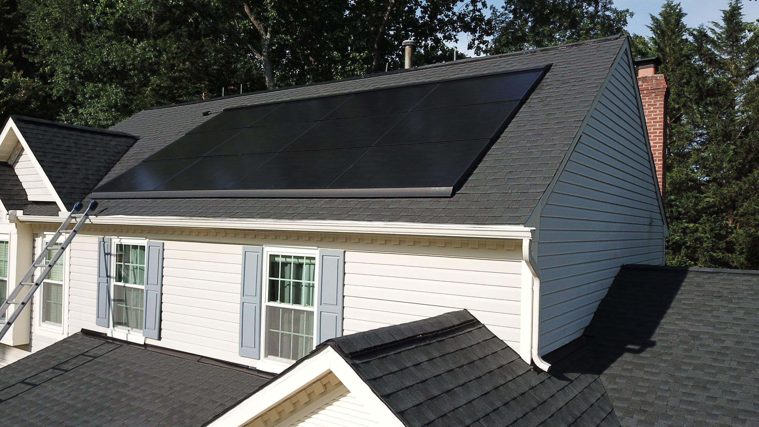 Exterior Home Makeover using GAF Timberline HDZ, GAF Decotech, and James Hardie Siding by American Home Contractors