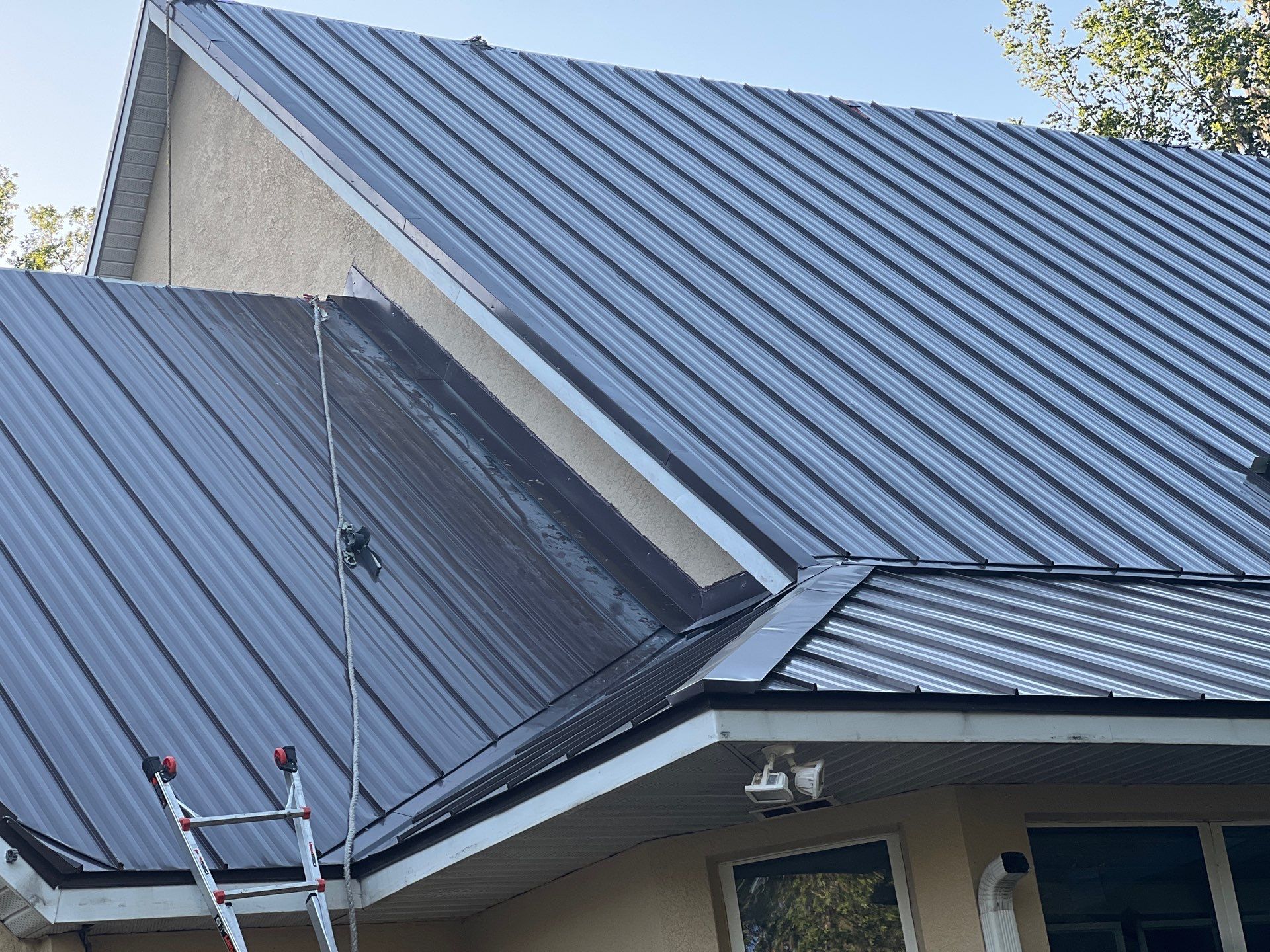 Charcoal Brown Standing Seam by Reimagine Roofing