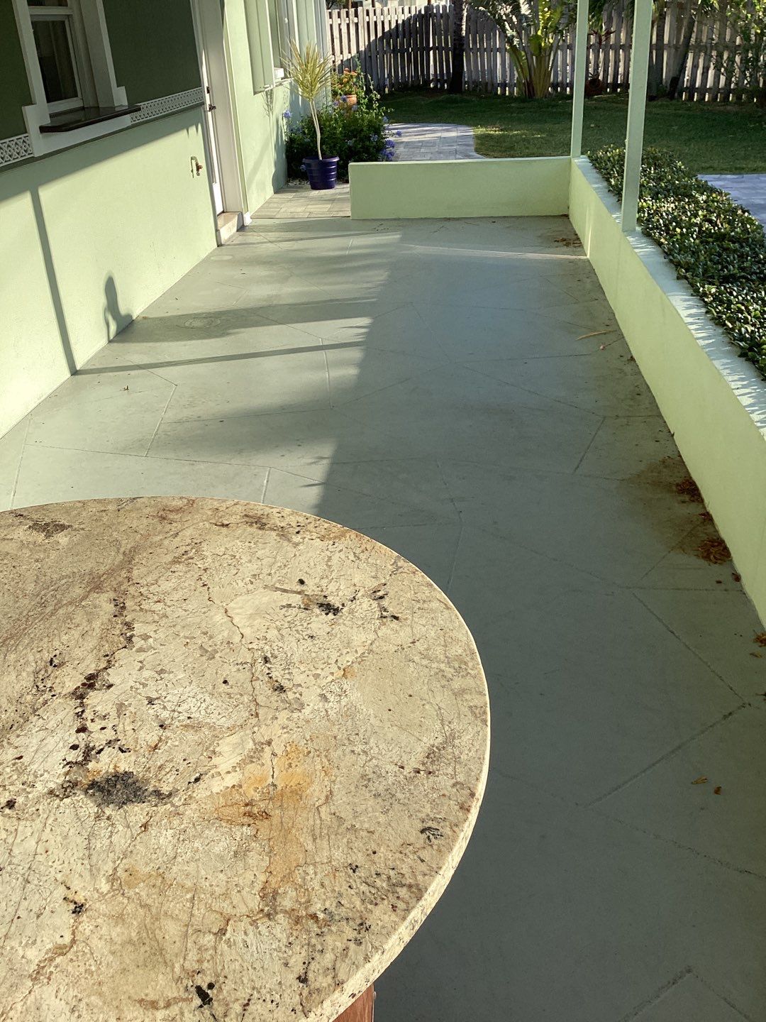 Patio using Mt Everest by Amvet concrete coatings llc