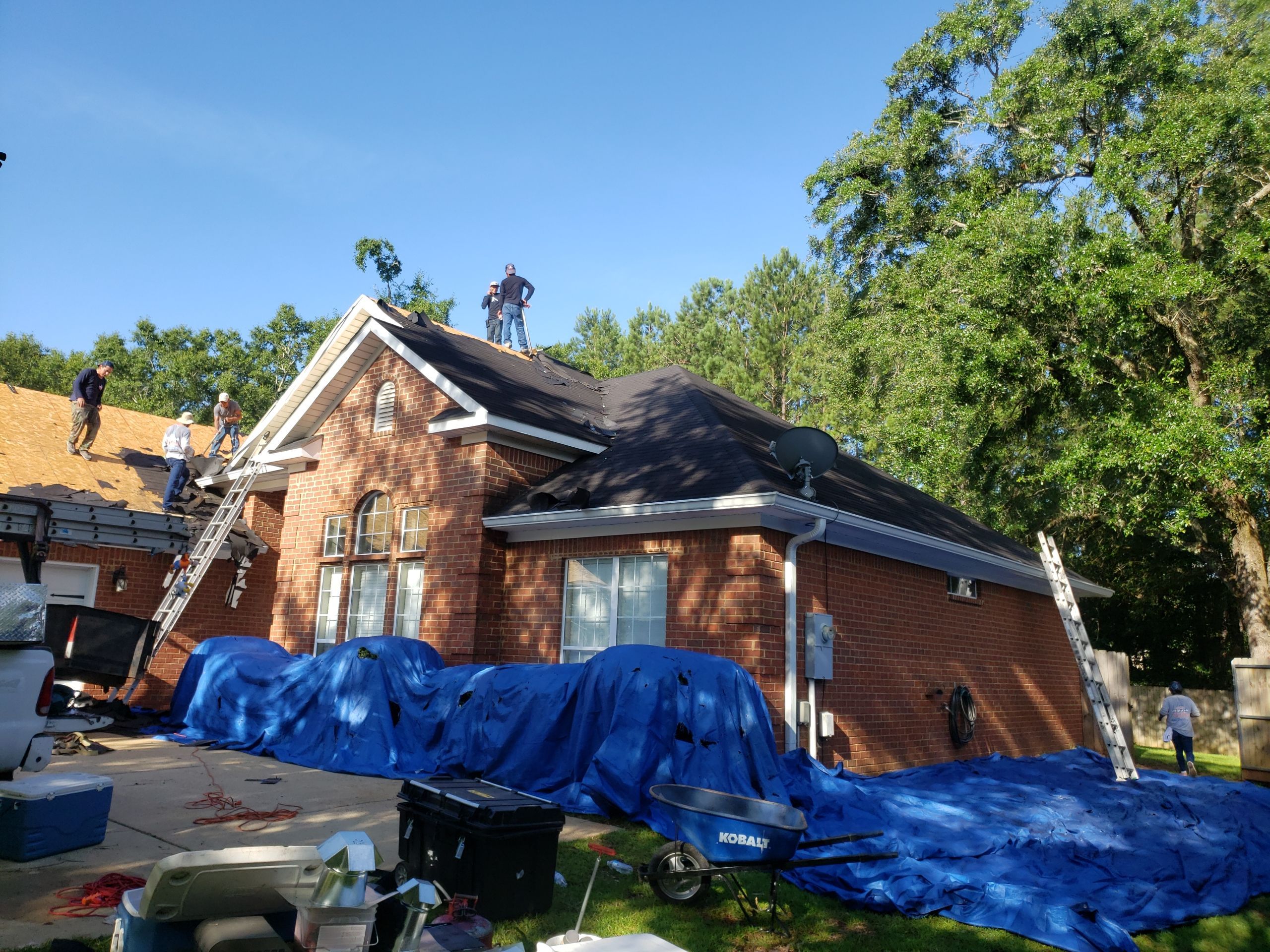 Residential Roofing Installation using Roof Replacement by American Roofing & Construction LLC
