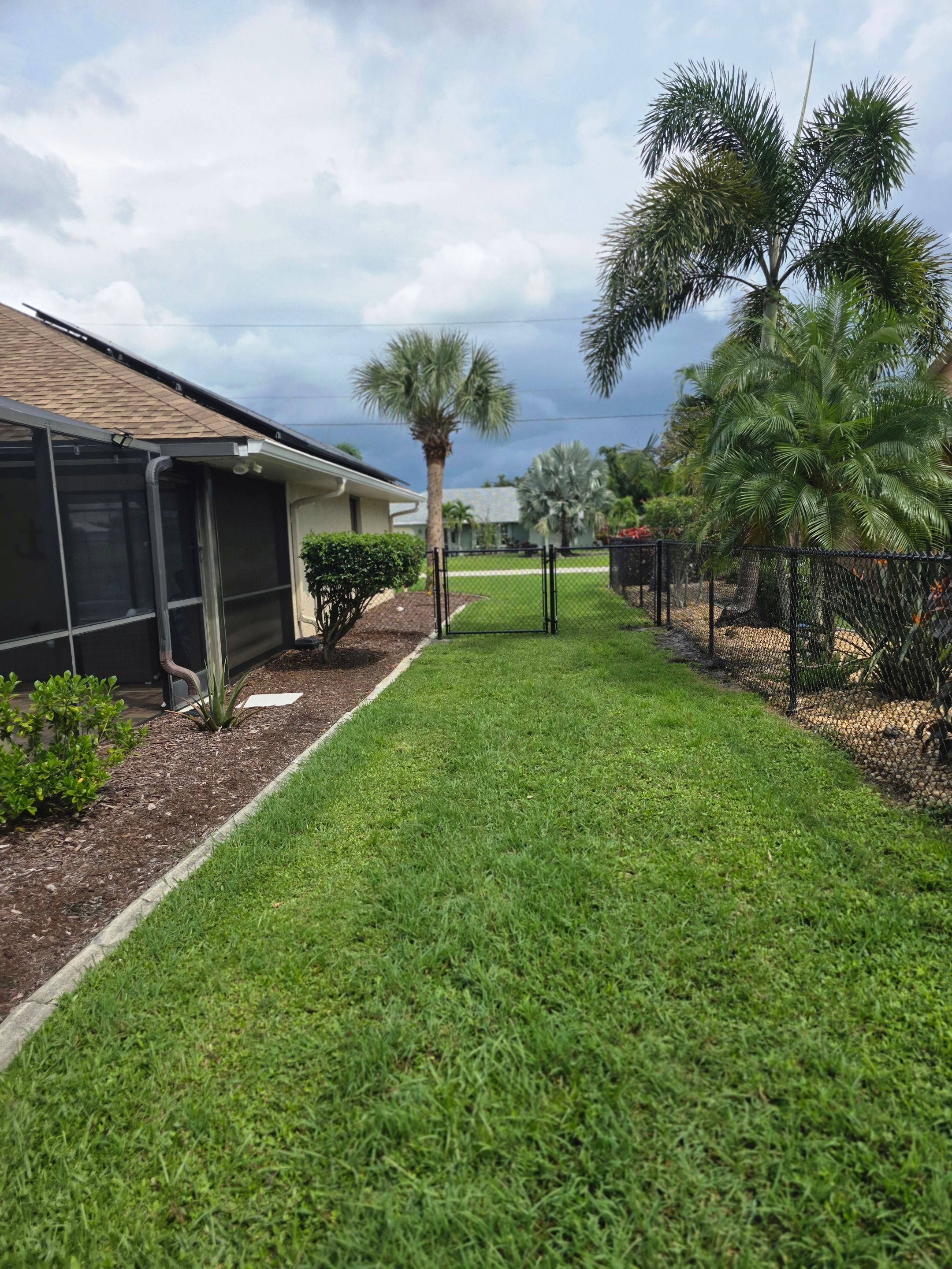 Black Vinyl-Coated Chain Link Fence Installation in Punta Gorda by True Fence LLC