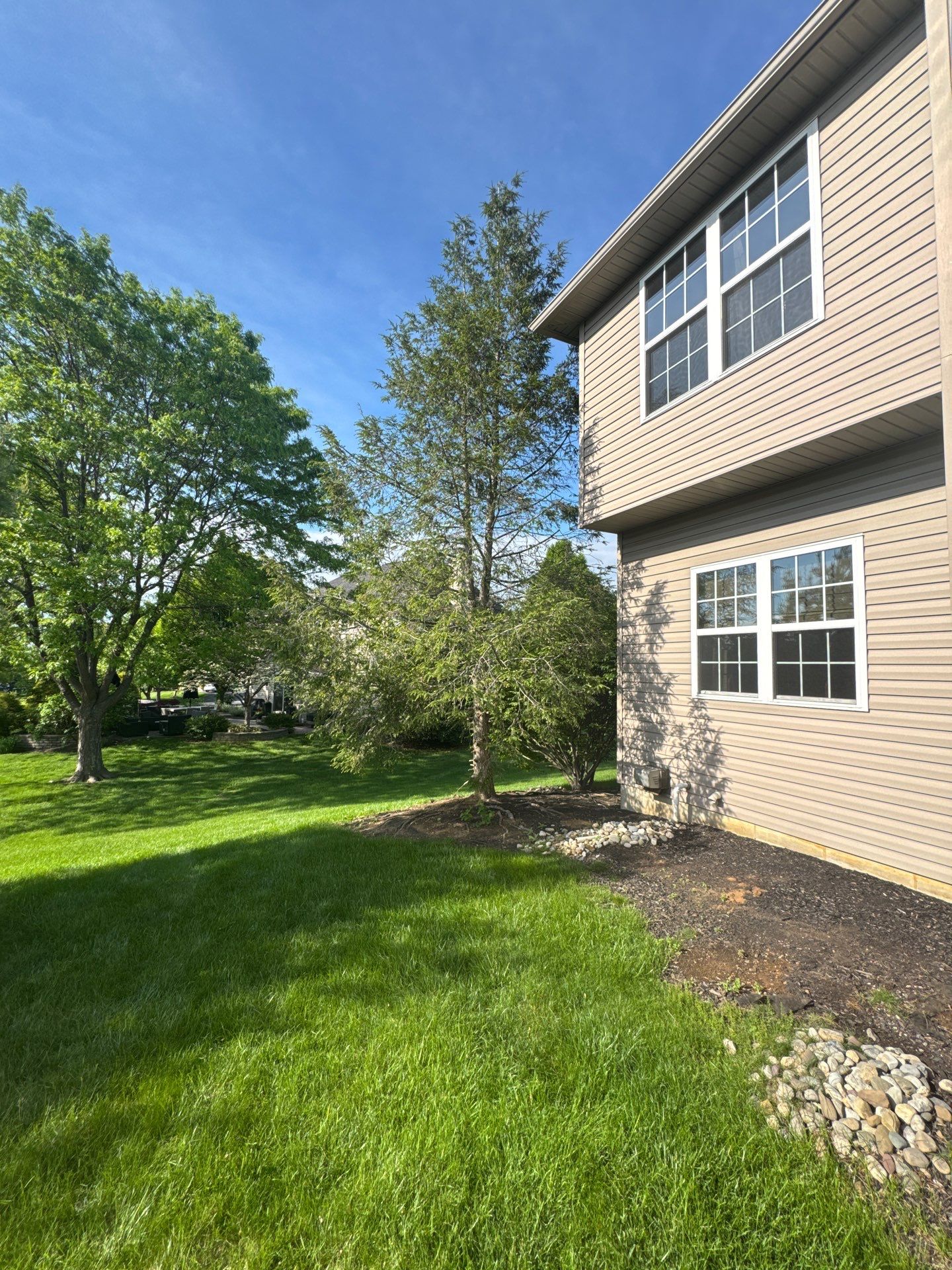 Backyard Retreat: Techo-Bloc Patio + Firepit Lounge by Saylor’s Lawn & Landscape