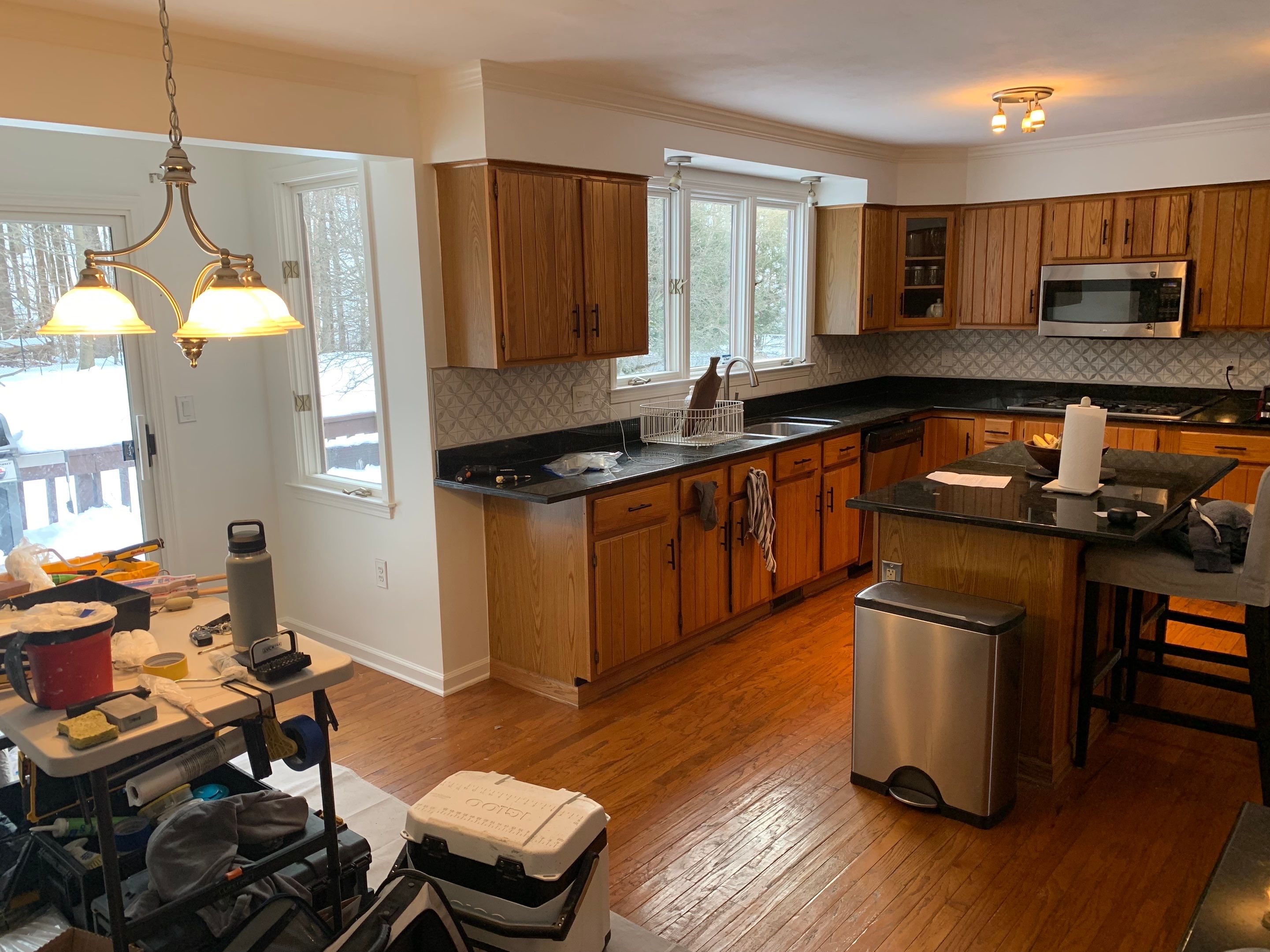 Painting Stained Wood Trim and Staircase. Walls too! by Empire Painting Services, LLC