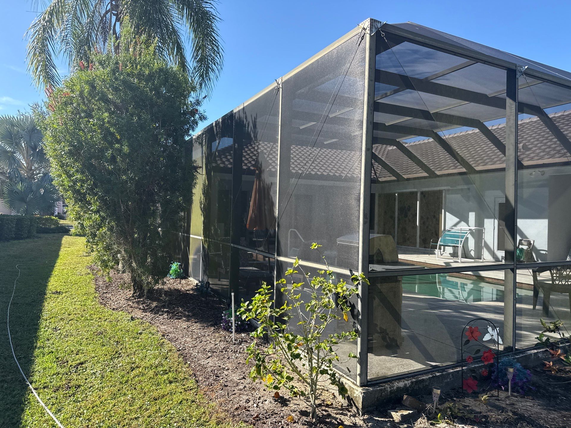 Painted Pool Deck, Lanai & Pool Cage Cleaning in River Club South – Bradenton, FL by Sunshine AquaWash