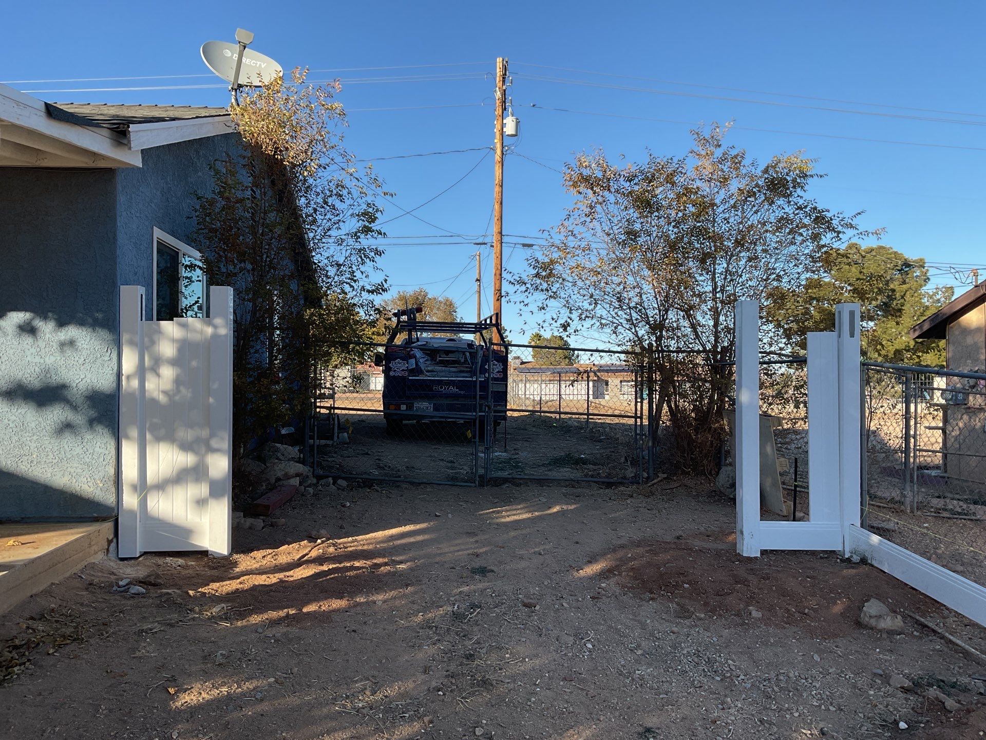 Fence Installation using vinyl and chain link  by Fence Guys Inc. 