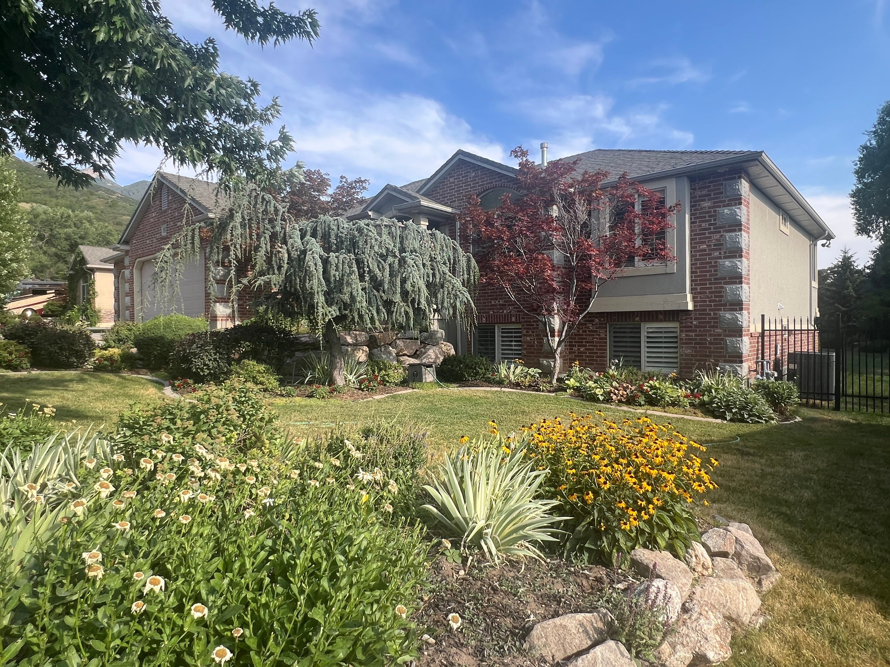 Ogden | Stucco Demo & Custom B&B Archway | Monterey Taupe by Ideal Siding Utah