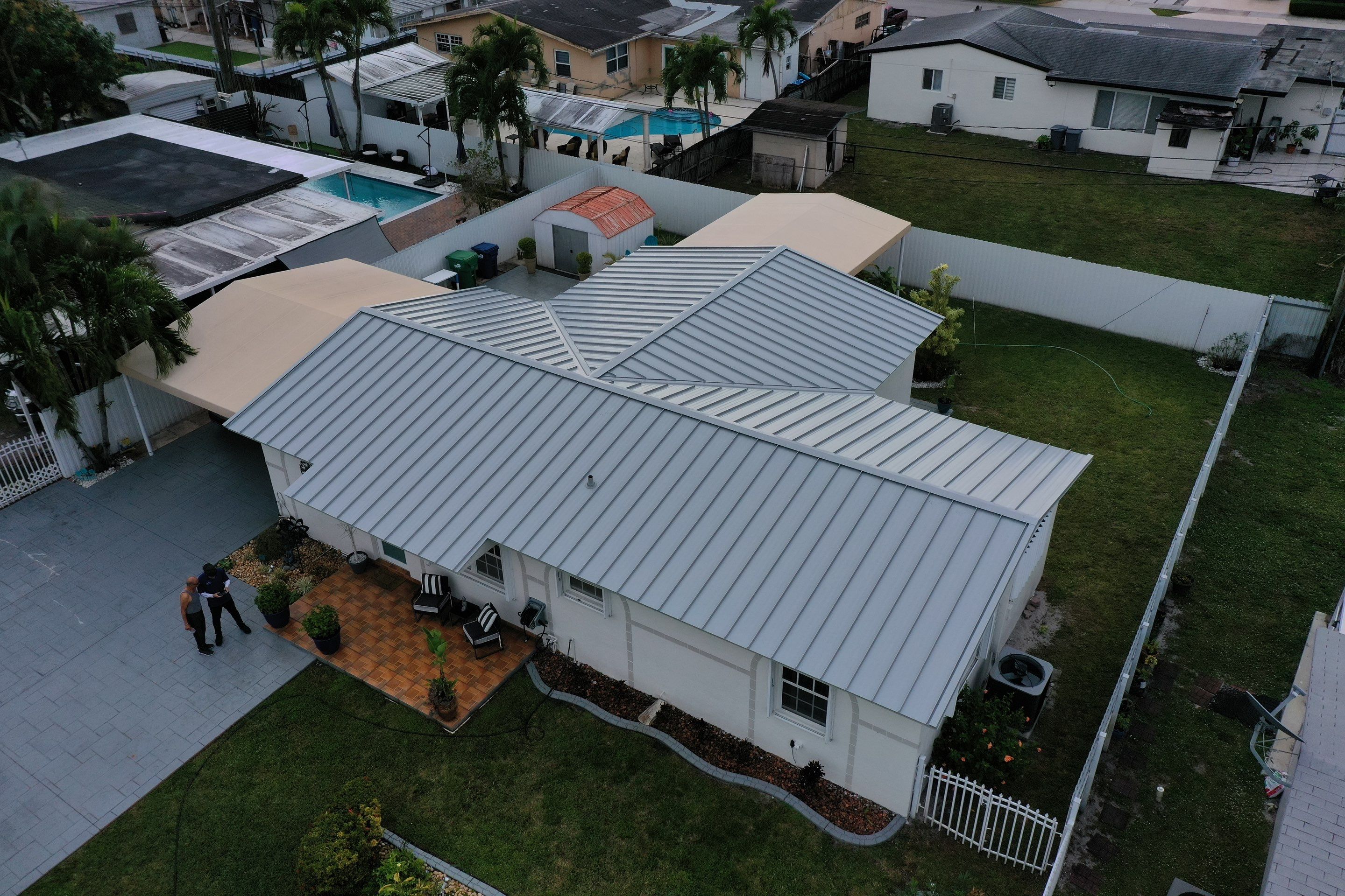 RESIDENTAL METAL REROOF 24 GUAGE DOVE GRAY 1-1/2" MECHANICAL SEAM METAL POLYGLASS POLYSTICK XFR by Earl W. Johnston Roofing 