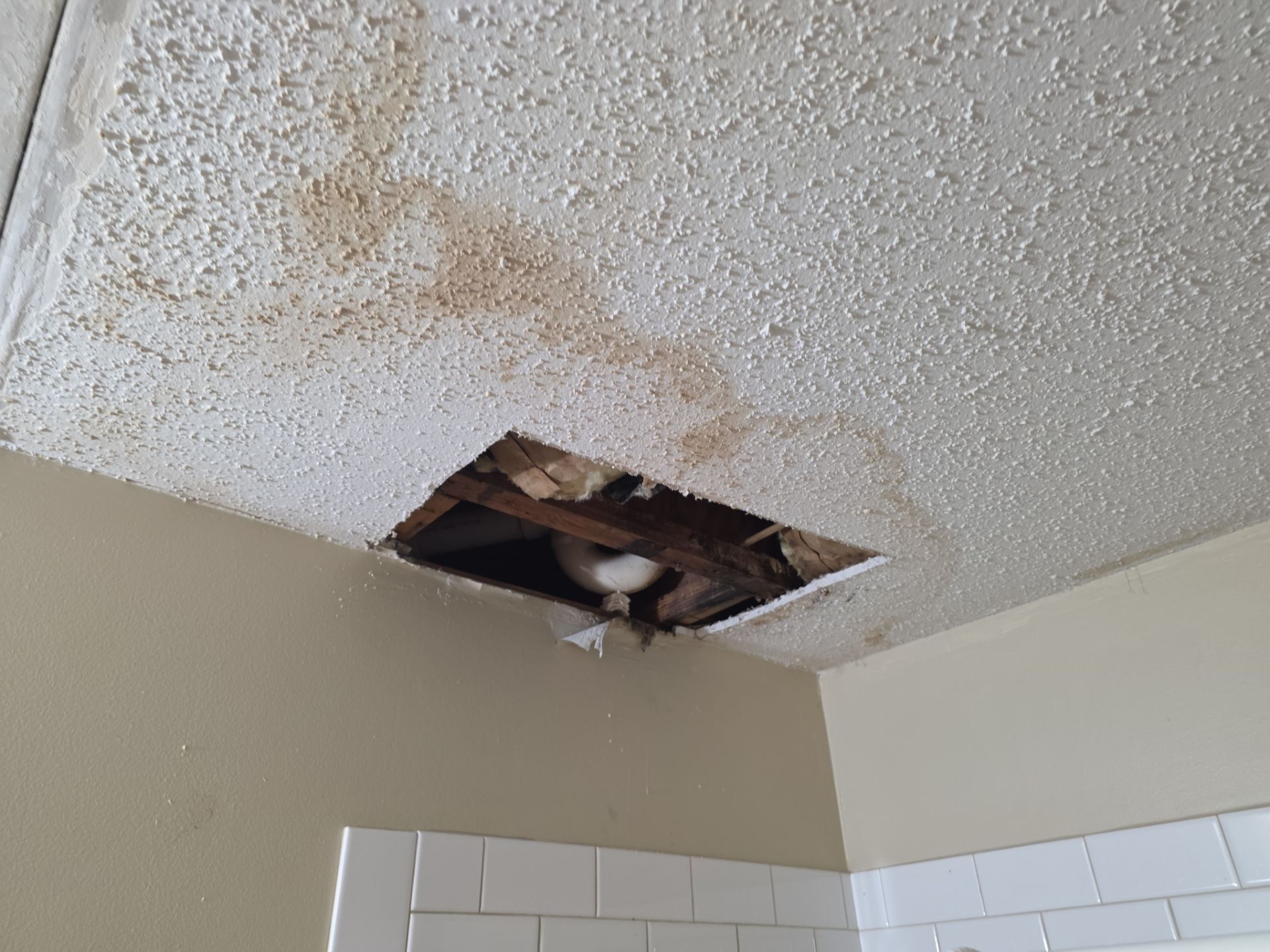 Bathroom Ceiling Repair and Texture Restoration in Wilmington, NC by RGR Construction and Roofing, LLC