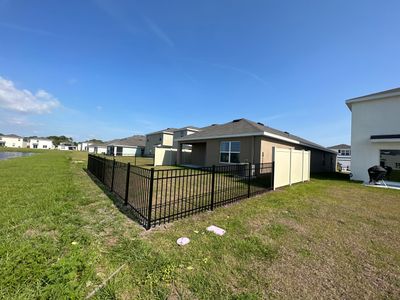 Aluminum Fence Installation using Vinyl Fence and Black 3 Rail Aluminum Fence 