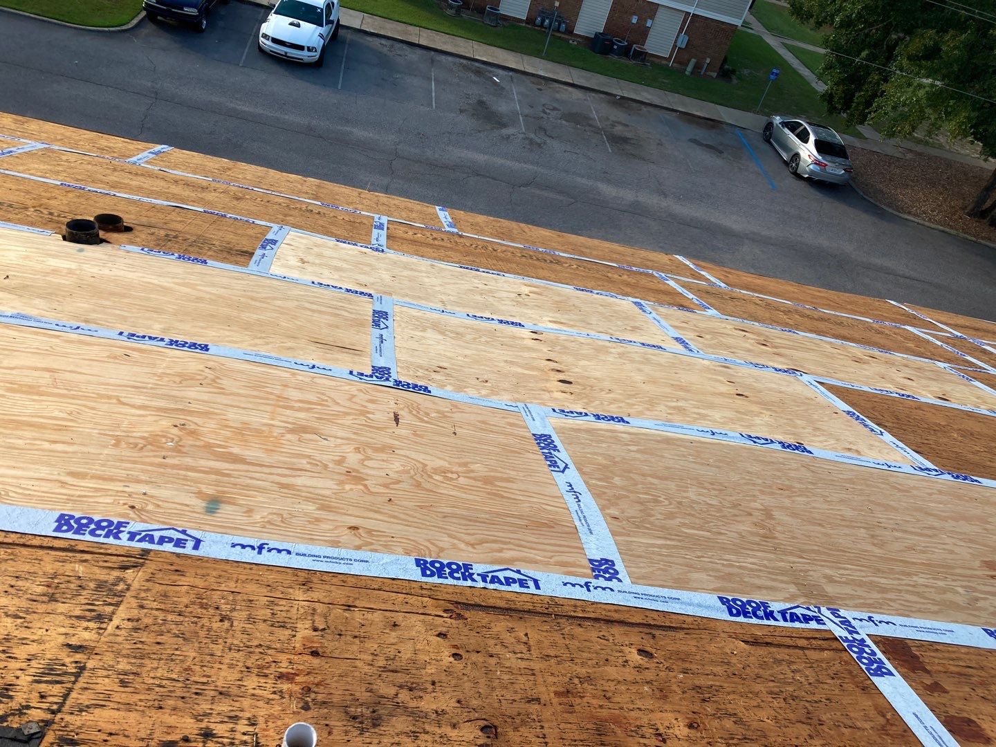 Residential Roofing Installation using Roof Replacement by American Roofing & Construction LLC