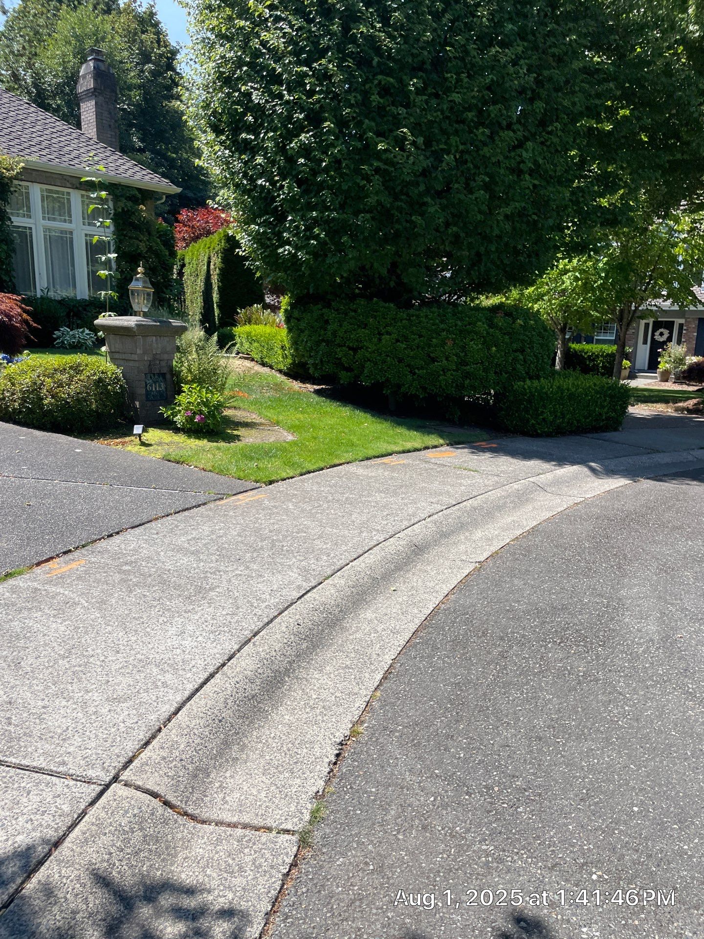 Multi-color Stamped & Sealed Concrete Driveway Renovation | Mukilteo by Jireh Asphalt & Concrete Inc