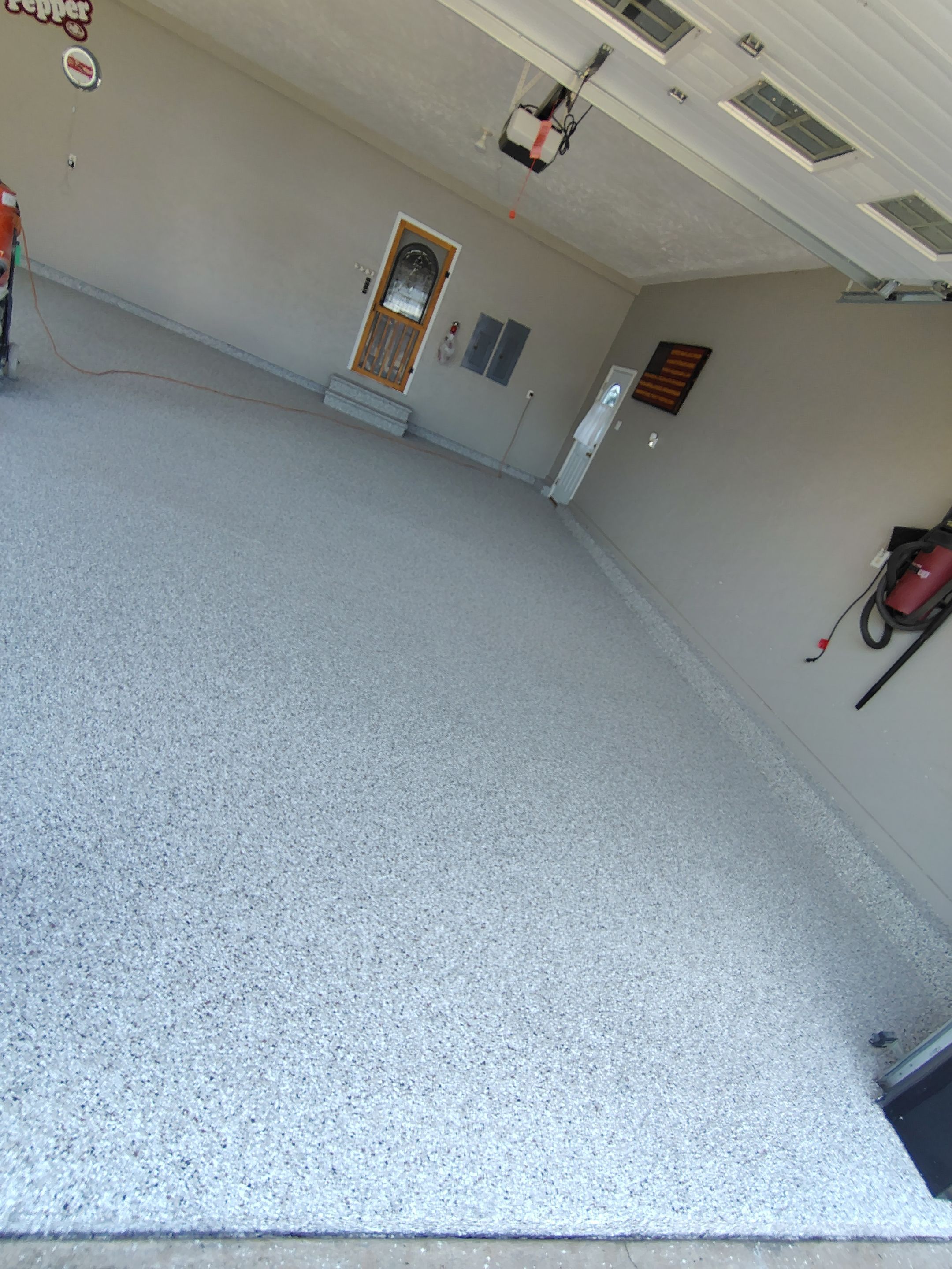 Garage Concrete Floor Coating and Crack Repair in Onawa by Select Painting, Coatings & Garage Cabinets