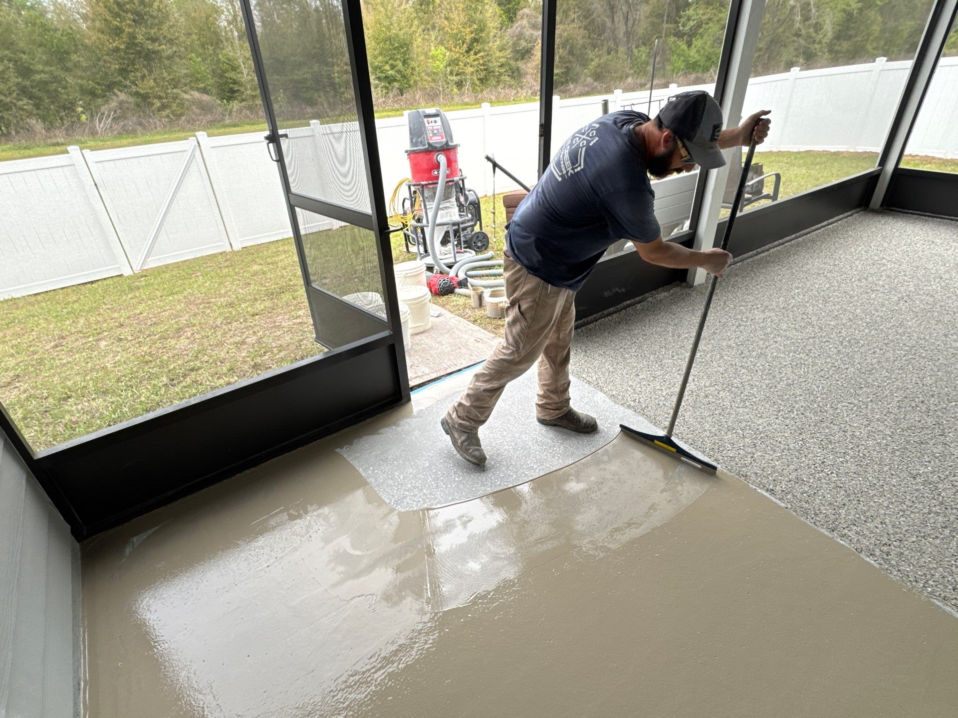 Back Porch in Mediterranean  by Cross Creek Concrete Coatings