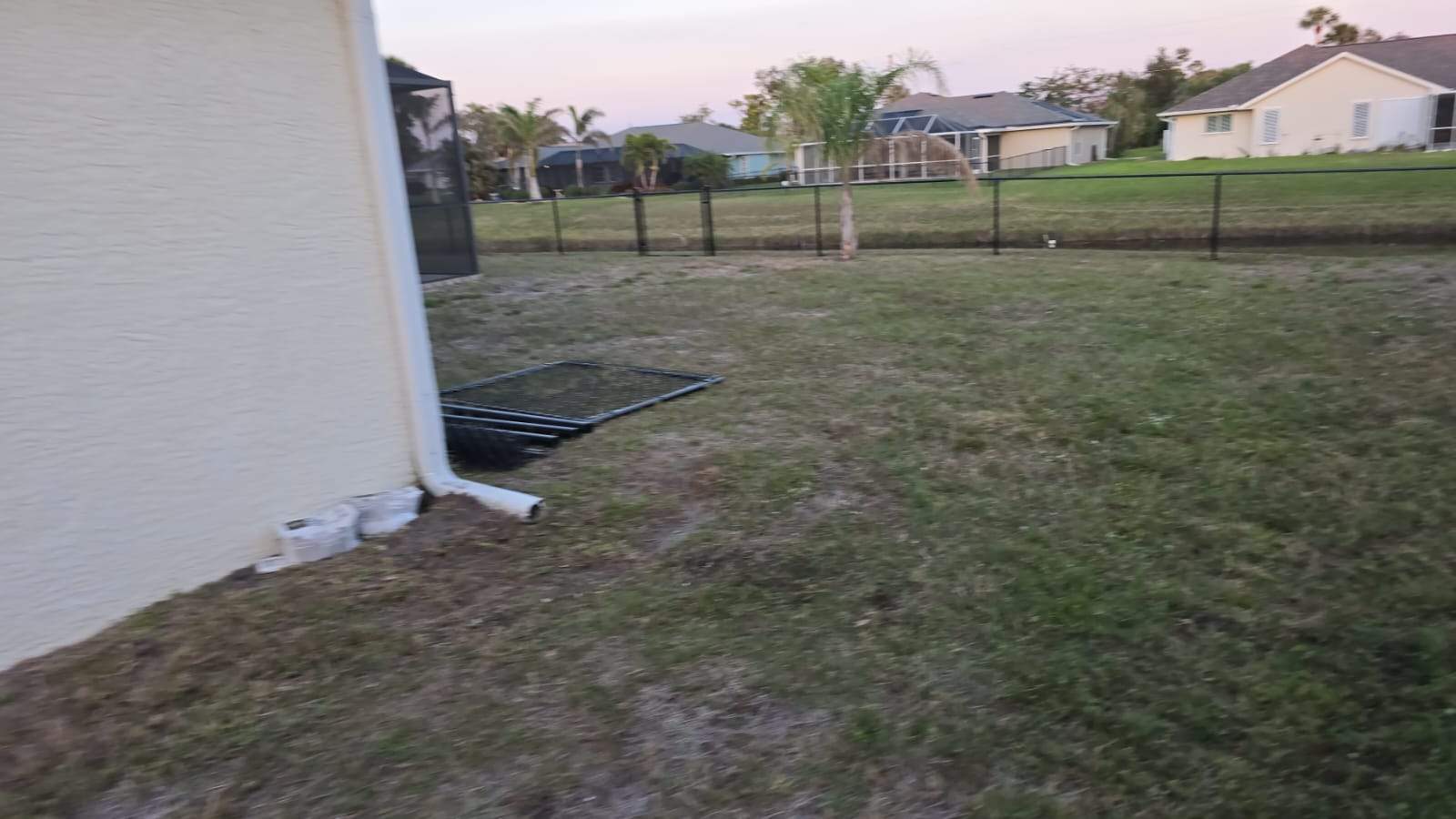 Waterfront Black Chain Link Fence Installation in Rotonda West by True Fence LLC