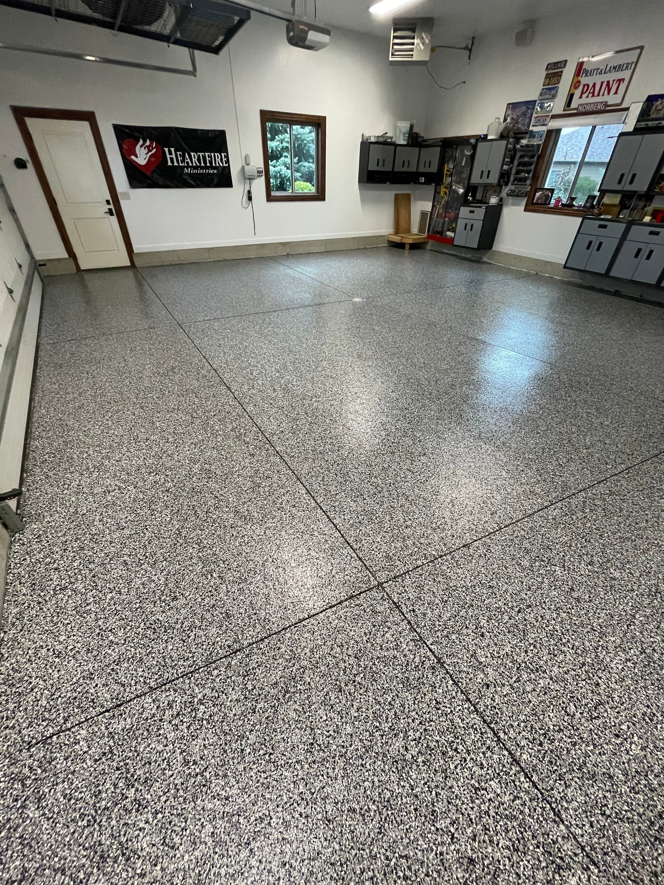 Garage Floor Coating and Domino Flake Finish in Sioux Falls by Select Painting, Coatings & Garage Cabinets