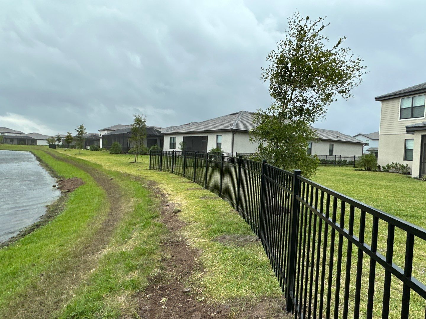 Aluminum Fence Installation using Black 3 Rail Aluminum Fence by Asap fence and gates, LLC