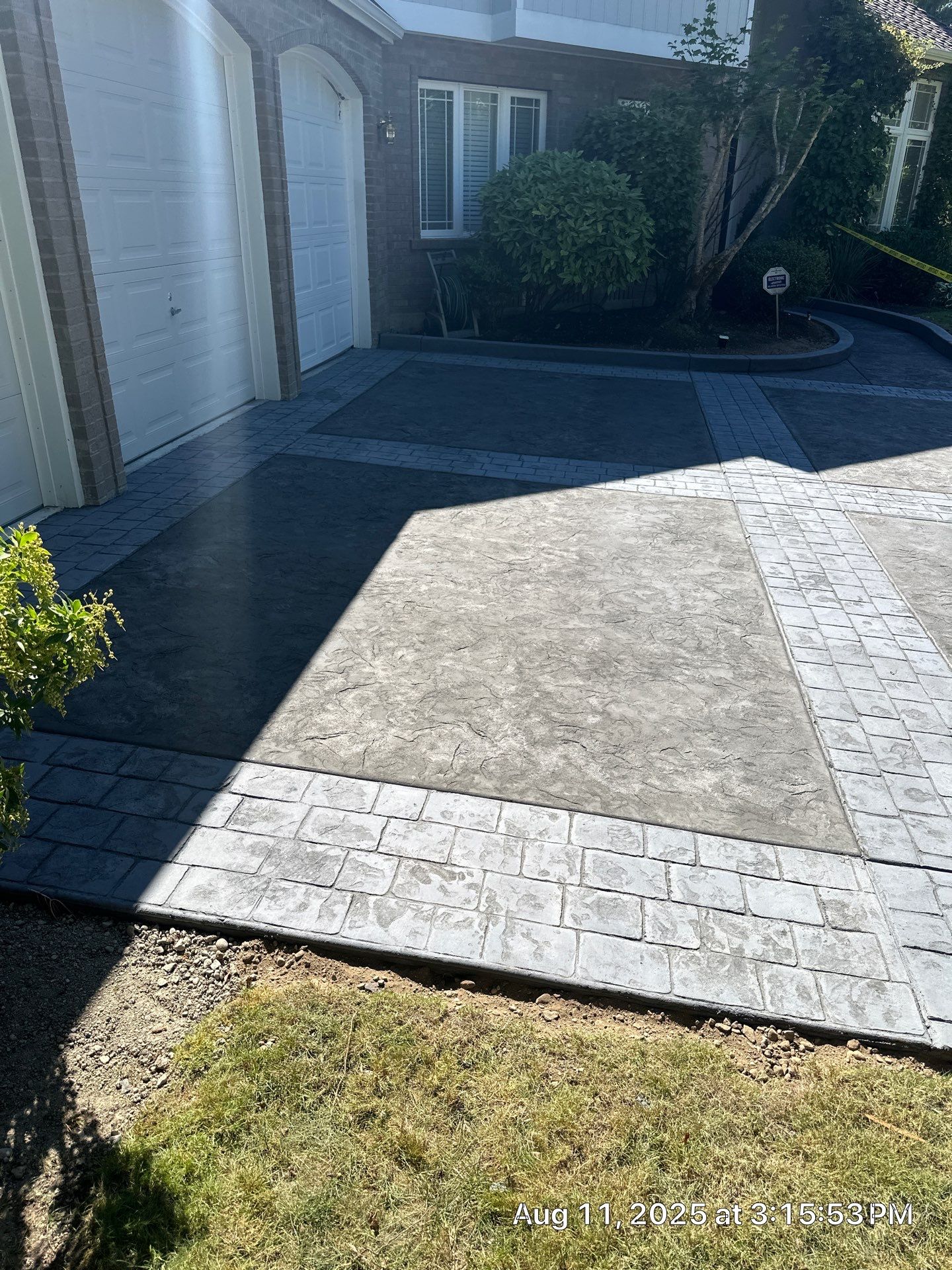 Multi-color Stamped & Sealed Concrete Driveway Renovation | Mukilteo by Jireh Asphalt & Concrete Inc