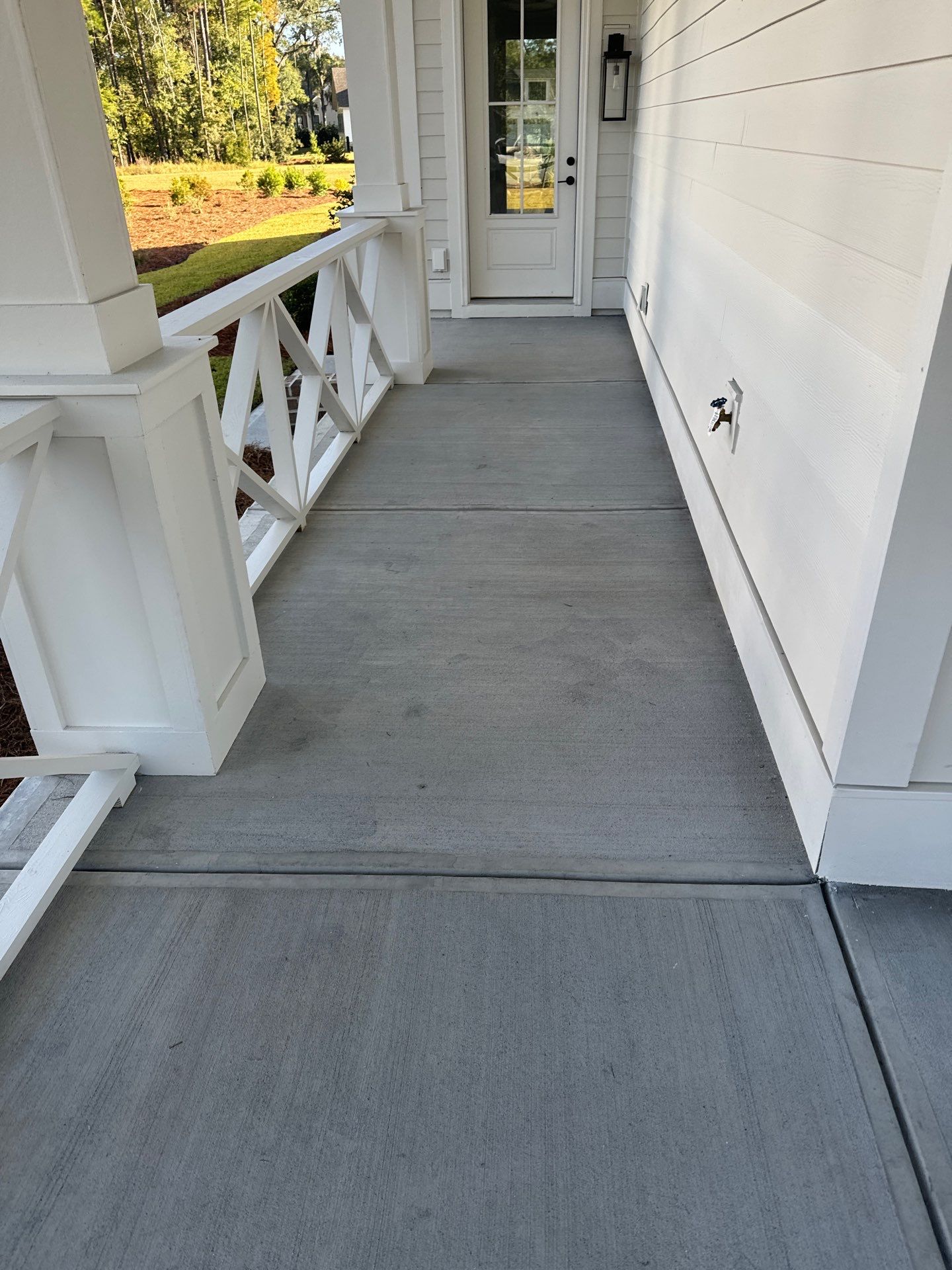 New Concrete Porch and Entryway Installation in Bloomingdale by Lowcountry Scapes, LLC