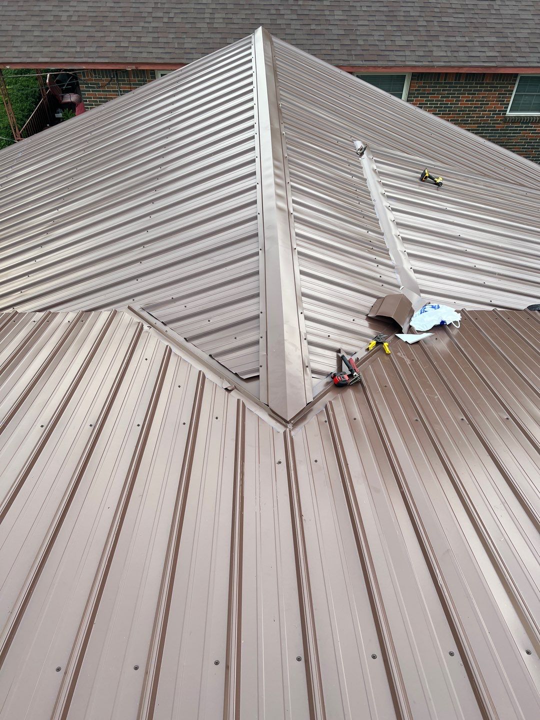 Residential Roofing Installation using 26 Gauge Metal by The Roofing Dudes