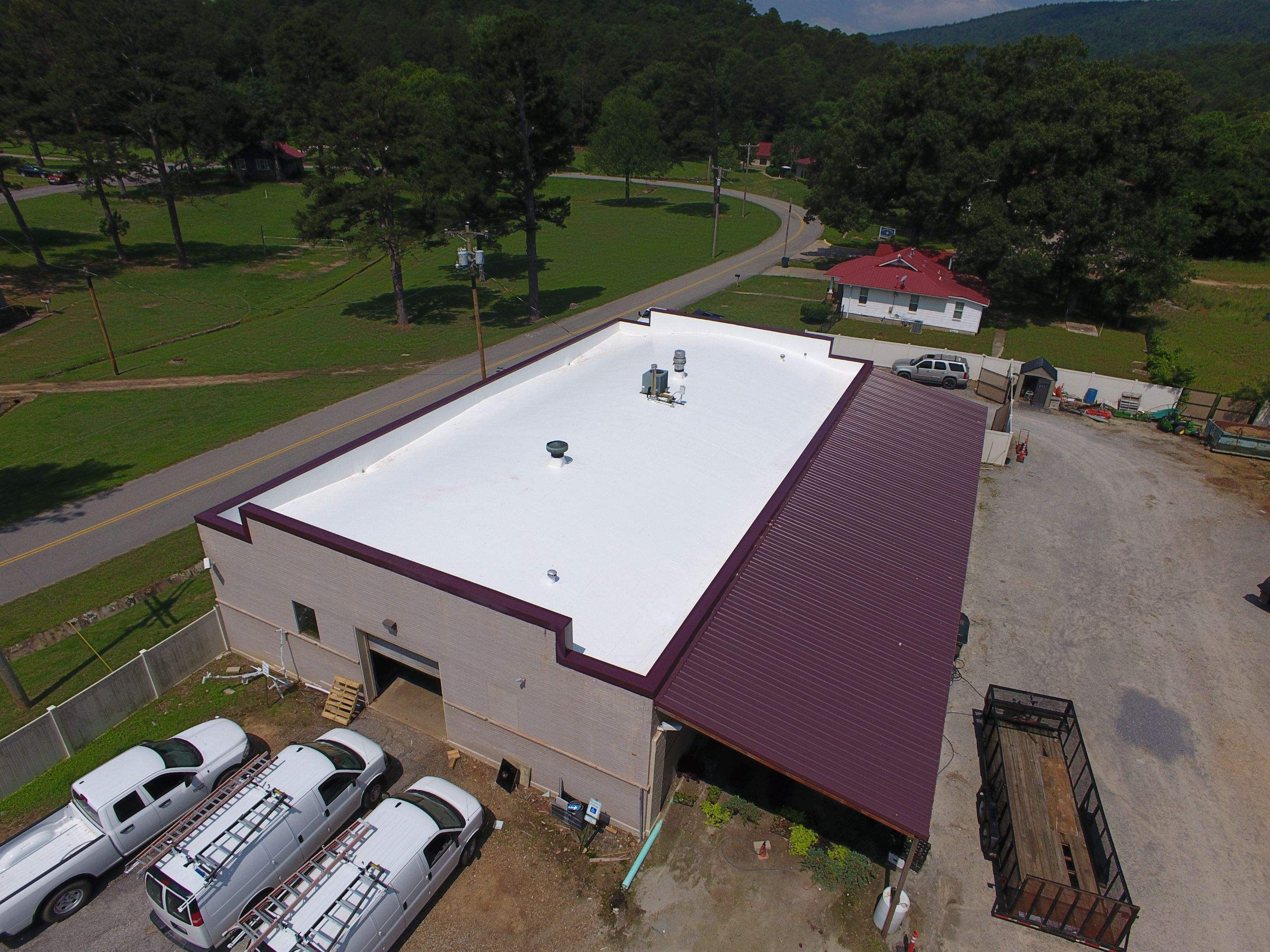 Choctaw Nation Healthcare Center - White Building by Hostetler Roofing