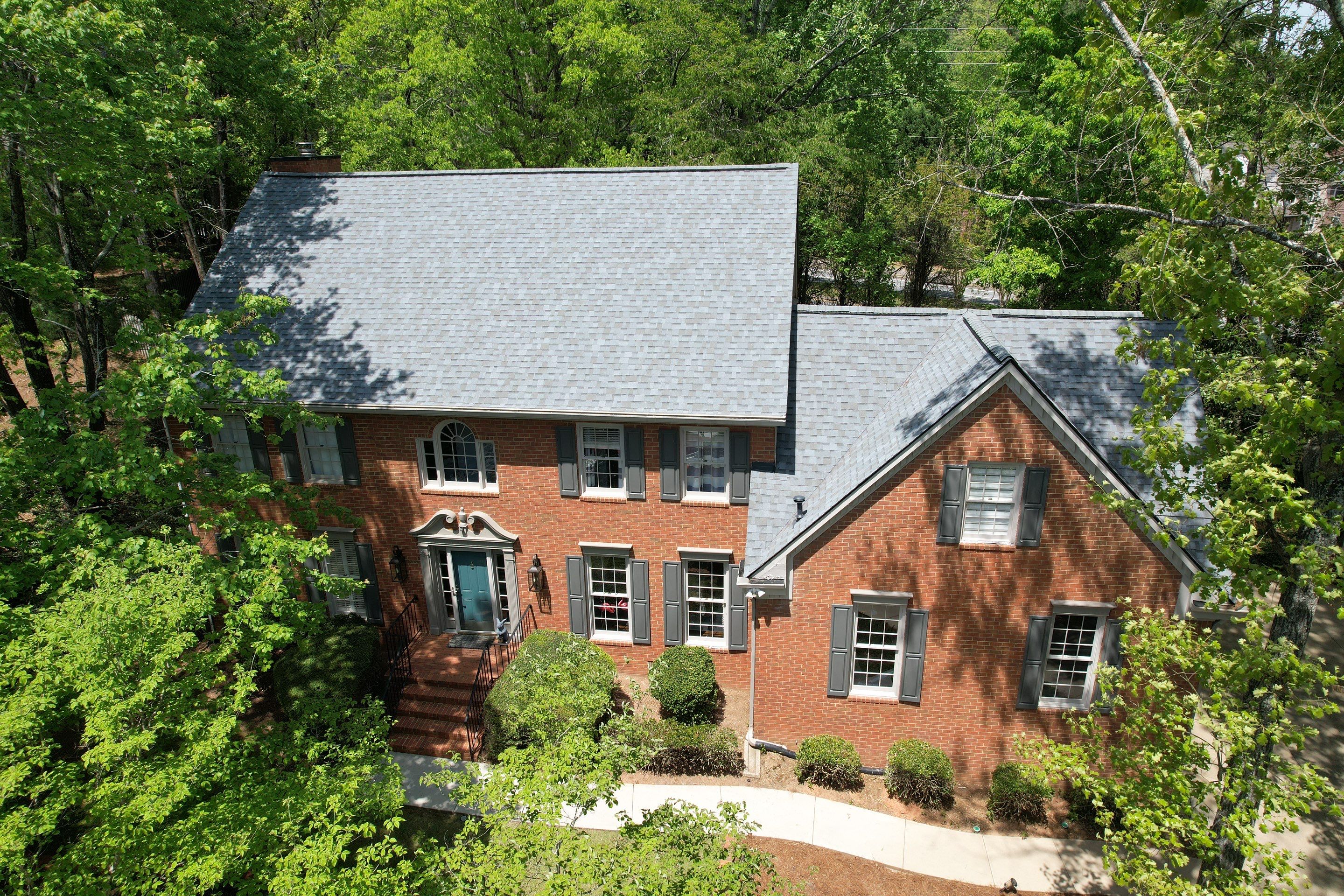 Residential Roofing Installation using Owens Corning Quary Gray by Inspector Roofing and Restoration