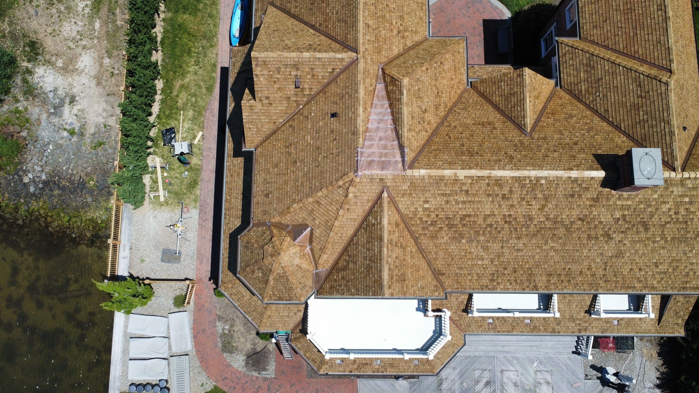 Residential Roofing Installation using Cedar Shakes by CMNG LLC