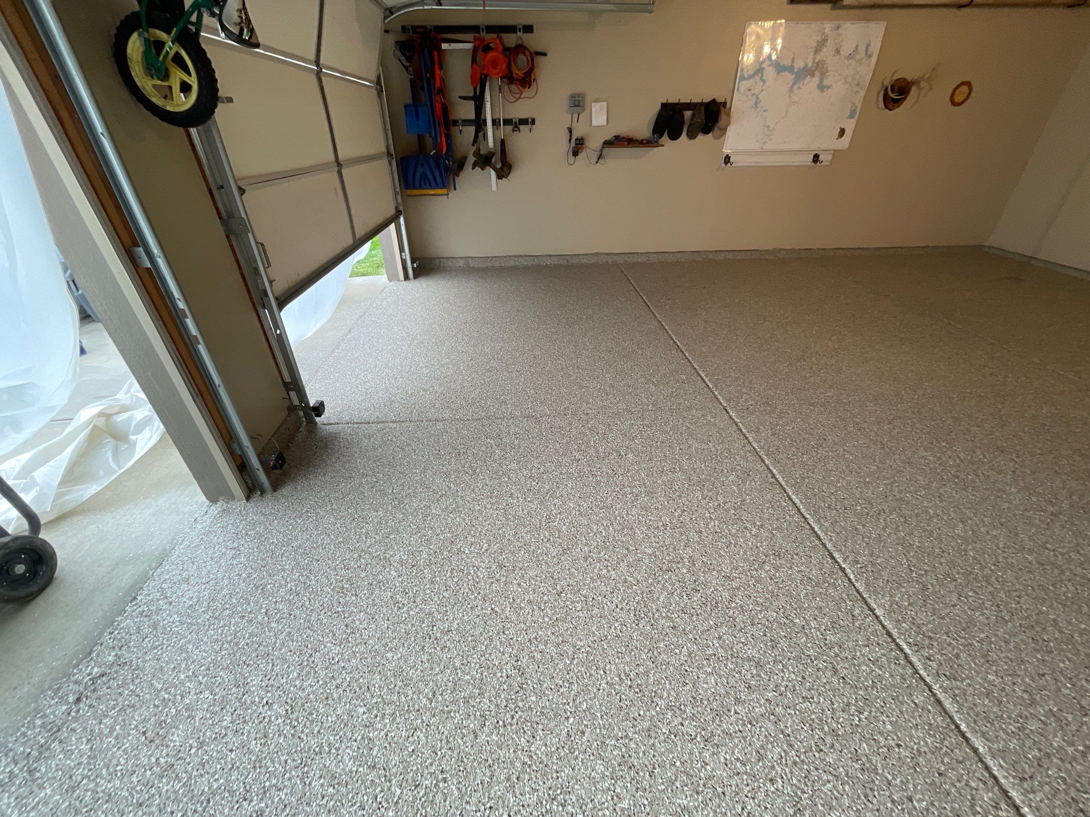 Garage Transformation using Pebble Beach and Front Porch using Greystone by Croc Coatings, LLC