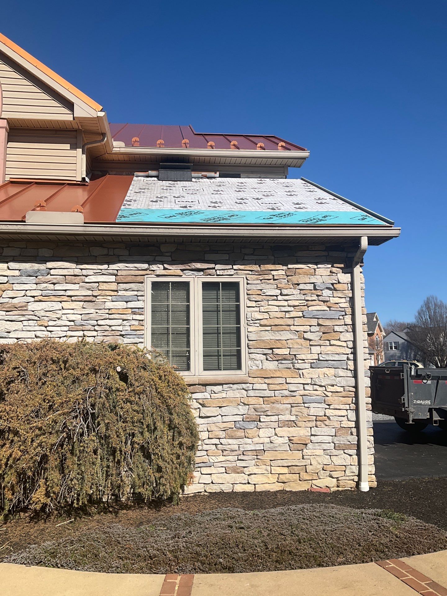 Standing Seam Roof – Copper Finish by Esh Builders